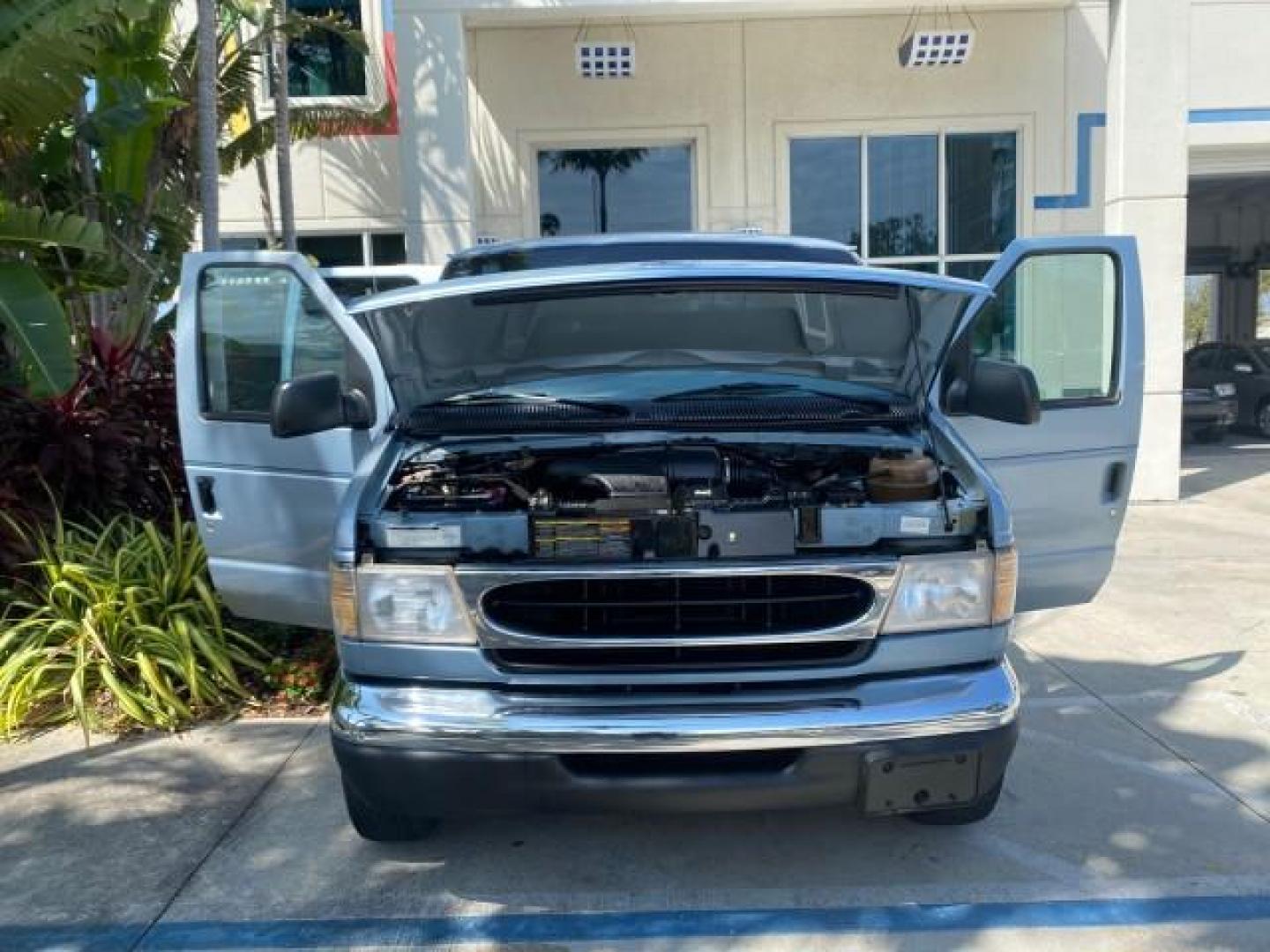 1999 Light Blue /Medium Parchment Ford Econoline Wagon XLT 15 PAS VAN EXT (1FBSS31S6XH) with an 6.8L EFI V10 Engine engine, Automatic transmission, located at 4701 North Dixie Hwy, Pompano Beach, FL, 33064, (954) 422-2889, 26.240938, -80.123474 - OUR WEBPAGE FLORIDACARS1.COM HAS OVER 100 PHOTOS AND FREE CARFAX LINK 1999 1999 FORD E-350 XL XLT SD 15 PASSENGER VIN: 1FBSS31S6XHB80914 VAN 6.8L V10 F SOHC 20V GASOLINE REAR WHEEL DRIVE Top Features Cloth Seats Basic Features ABS Brakes Air Conditioning Cassette Player Power Locks AM/FM Stereo Auto - Photo#16
