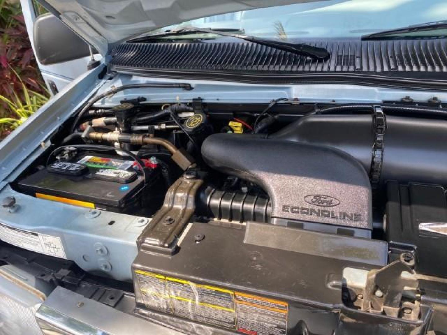 1999 Light Blue /Medium Parchment Ford Econoline Wagon XLT 15 PAS VAN EXT (1FBSS31S6XH) with an 6.8L EFI V10 Engine engine, Automatic transmission, located at 4701 North Dixie Hwy, Pompano Beach, FL, 33064, (954) 422-2889, 26.240938, -80.123474 - OUR WEBPAGE FLORIDACARS1.COM HAS OVER 100 PHOTOS AND FREE CARFAX LINK 1999 1999 FORD E-350 XL XLT SD 15 PASSENGER VIN: 1FBSS31S6XHB80914 VAN 6.8L V10 F SOHC 20V GASOLINE REAR WHEEL DRIVE Top Features Cloth Seats Basic Features ABS Brakes Air Conditioning Cassette Player Power Locks AM/FM Stereo Auto - Photo#24