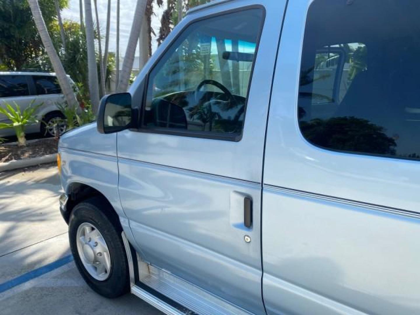 1999 Light Blue /Medium Parchment Ford Econoline Wagon XLT 15 PAS VAN EXT (1FBSS31S6XH) with an 6.8L EFI V10 Engine engine, Automatic transmission, located at 4701 North Dixie Hwy, Pompano Beach, FL, 33064, (954) 422-2889, 26.240938, -80.123474 - OUR WEBPAGE FLORIDACARS1.COM HAS OVER 100 PHOTOS AND FREE CARFAX LINK 1999 1999 FORD E-350 XL XLT SD 15 PASSENGER VIN: 1FBSS31S6XHB80914 VAN 6.8L V10 F SOHC 20V GASOLINE REAR WHEEL DRIVE Top Features Cloth Seats Basic Features ABS Brakes Air Conditioning Cassette Player Power Locks AM/FM Stereo Auto - Photo#26