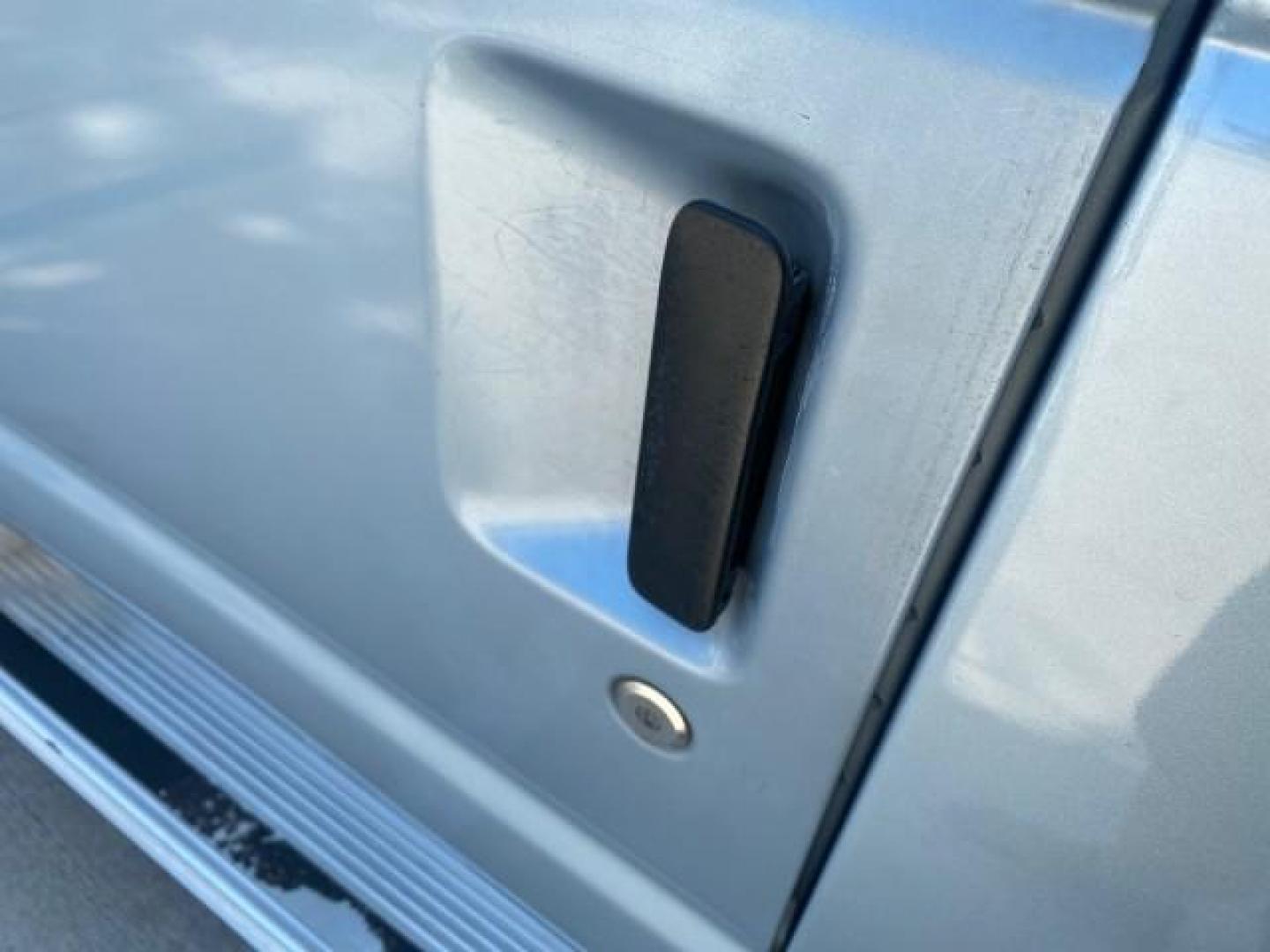 1999 Light Blue /Medium Parchment Ford Econoline Wagon XLT 15 PAS VAN EXT (1FBSS31S6XH) with an 6.8L EFI V10 Engine engine, Automatic transmission, located at 4701 North Dixie Hwy, Pompano Beach, FL, 33064, (954) 422-2889, 26.240938, -80.123474 - OUR WEBPAGE FLORIDACARS1.COM HAS OVER 100 PHOTOS AND FREE CARFAX LINK 1999 1999 FORD E-350 XL XLT SD 15 PASSENGER VIN: 1FBSS31S6XHB80914 VAN 6.8L V10 F SOHC 20V GASOLINE REAR WHEEL DRIVE Top Features Cloth Seats Basic Features ABS Brakes Air Conditioning Cassette Player Power Locks AM/FM Stereo Auto - Photo#27