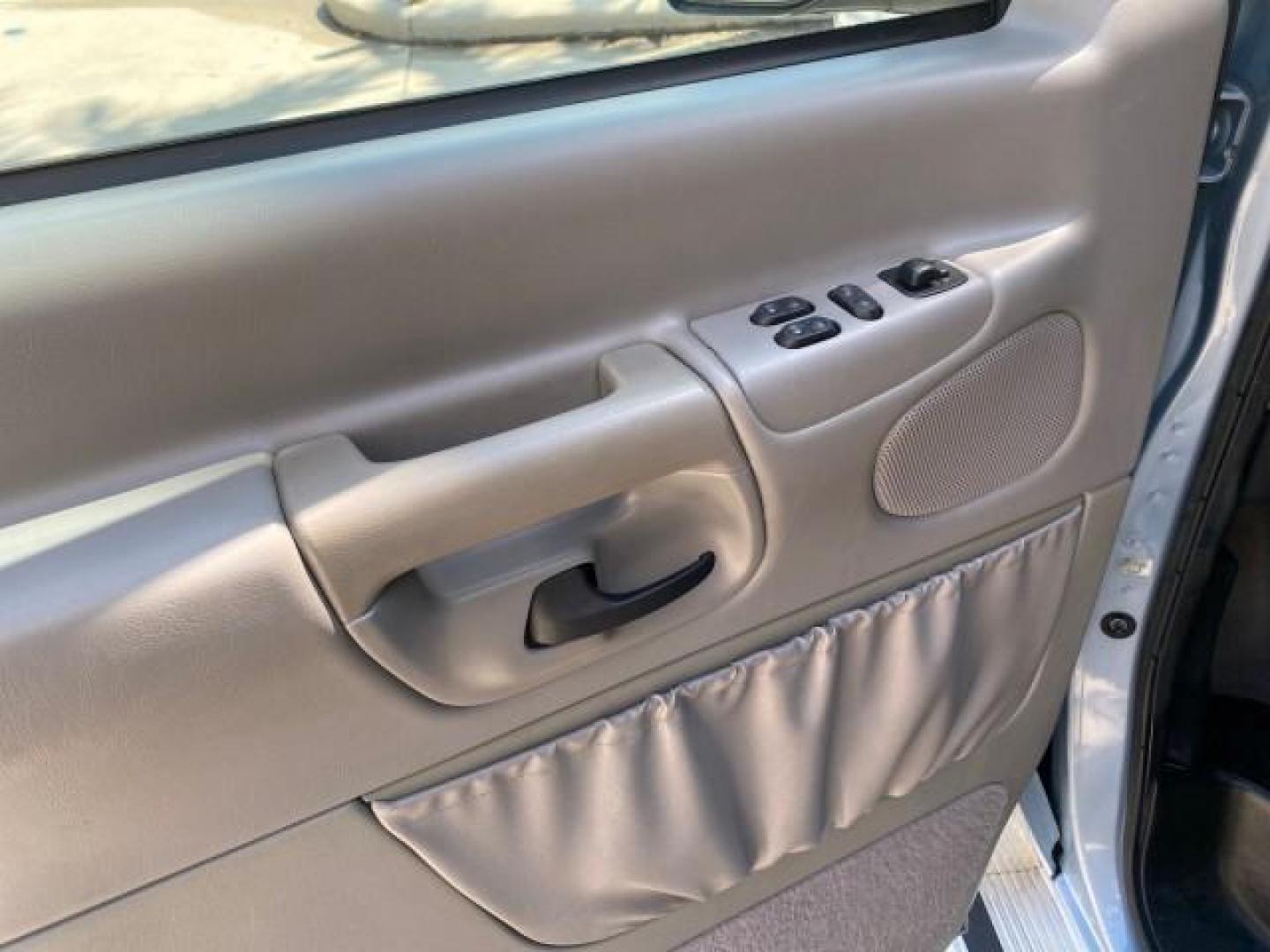 1999 Light Blue /Medium Parchment Ford Econoline Wagon XLT 15 PAS VAN EXT (1FBSS31S6XH) with an 6.8L EFI V10 Engine engine, Automatic transmission, located at 4701 North Dixie Hwy, Pompano Beach, FL, 33064, (954) 422-2889, 26.240938, -80.123474 - OUR WEBPAGE FLORIDACARS1.COM HAS OVER 100 PHOTOS AND FREE CARFAX LINK 1999 1999 FORD E-350 XL XLT SD 15 PASSENGER VIN: 1FBSS31S6XHB80914 VAN 6.8L V10 F SOHC 20V GASOLINE REAR WHEEL DRIVE Top Features Cloth Seats Basic Features ABS Brakes Air Conditioning Cassette Player Power Locks AM/FM Stereo Auto - Photo#28