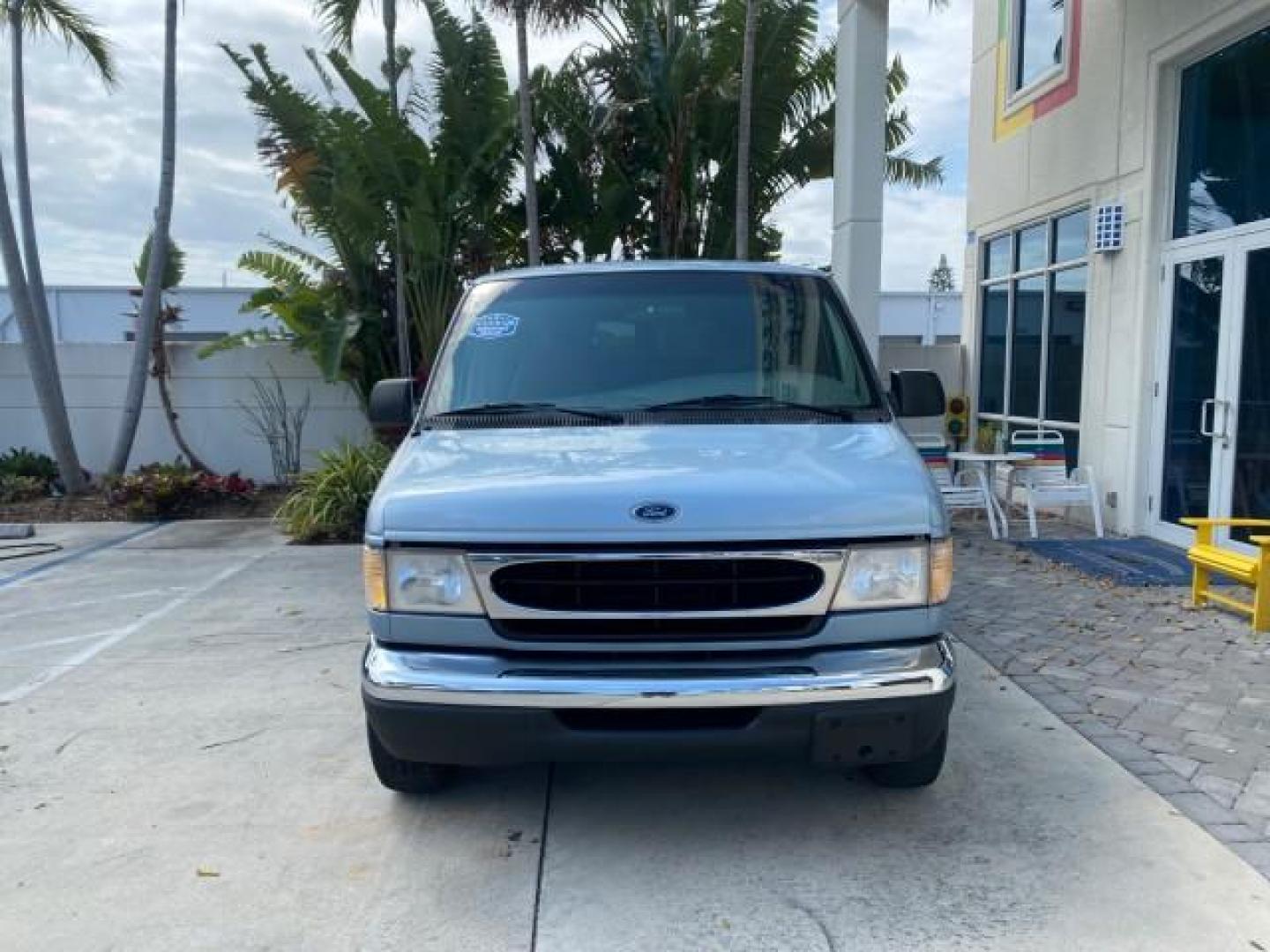 1999 Light Blue /Medium Parchment Ford Econoline Wagon XLT 15 PAS VAN EXT (1FBSS31S6XH) with an 6.8L EFI V10 Engine engine, Automatic transmission, located at 4701 North Dixie Hwy, Pompano Beach, FL, 33064, (954) 422-2889, 26.240938, -80.123474 - OUR WEBPAGE FLORIDACARS1.COM HAS OVER 100 PHOTOS AND FREE CARFAX LINK 1999 1999 FORD E-350 XL XLT SD 15 PASSENGER VIN: 1FBSS31S6XHB80914 VAN 6.8L V10 F SOHC 20V GASOLINE REAR WHEEL DRIVE Top Features Cloth Seats Basic Features ABS Brakes Air Conditioning Cassette Player Power Locks AM/FM Stereo Auto - Photo#2