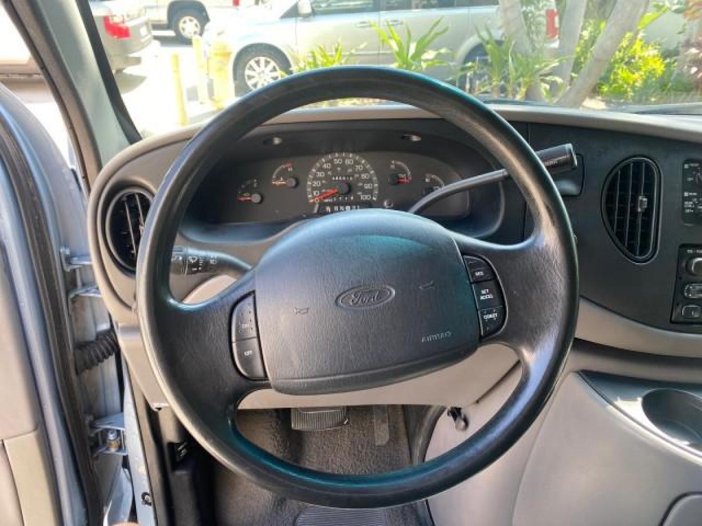 1999 Light Blue /Medium Parchment Ford Econoline Wagon XLT 15 PAS VAN EXT (1FBSS31S6XH) with an 6.8L EFI V10 Engine engine, Automatic transmission, located at 4701 North Dixie Hwy, Pompano Beach, FL, 33064, (954) 422-2889, 26.240938, -80.123474 - OUR WEBPAGE FLORIDACARS1.COM HAS OVER 100 PHOTOS AND FREE CARFAX LINK 1999 1999 FORD E-350 XL XLT SD 15 PASSENGER VIN: 1FBSS31S6XHB80914 VAN 6.8L V10 F SOHC 20V GASOLINE REAR WHEEL DRIVE Top Features Cloth Seats Basic Features ABS Brakes Air Conditioning Cassette Player Power Locks AM/FM Stereo Auto - Photo#32