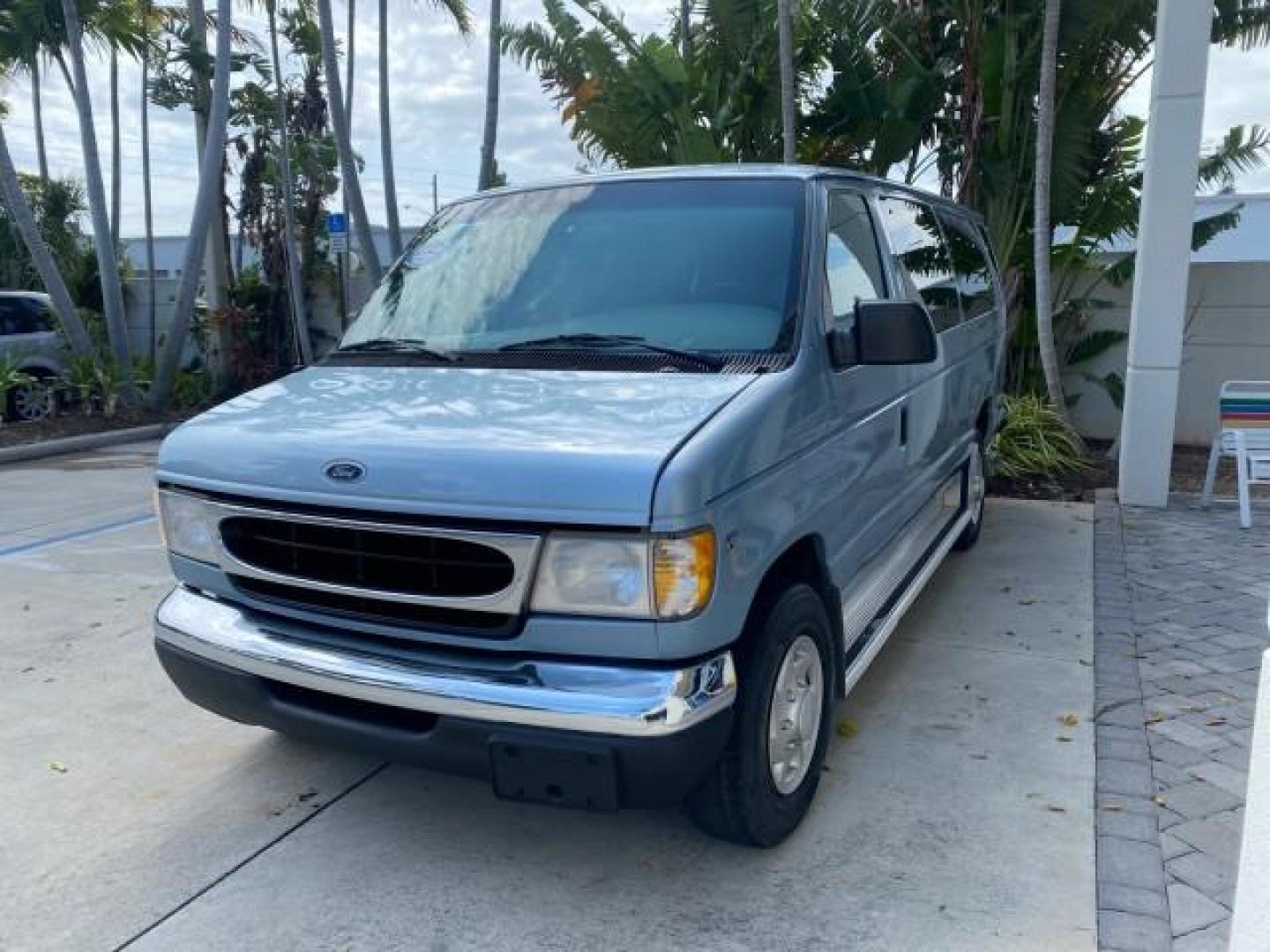 1999 Light Blue /Medium Parchment Ford Econoline Wagon XLT 15 PAS VAN EXT (1FBSS31S6XH) with an 6.8L EFI V10 Engine engine, Automatic transmission, located at 4701 North Dixie Hwy, Pompano Beach, FL, 33064, (954) 422-2889, 26.240938, -80.123474 - OUR WEBPAGE FLORIDACARS1.COM HAS OVER 100 PHOTOS AND FREE CARFAX LINK 1999 1999 FORD E-350 XL XLT SD 15 PASSENGER VIN: 1FBSS31S6XHB80914 VAN 6.8L V10 F SOHC 20V GASOLINE REAR WHEEL DRIVE Top Features Cloth Seats Basic Features ABS Brakes Air Conditioning Cassette Player Power Locks AM/FM Stereo Auto - Photo#3