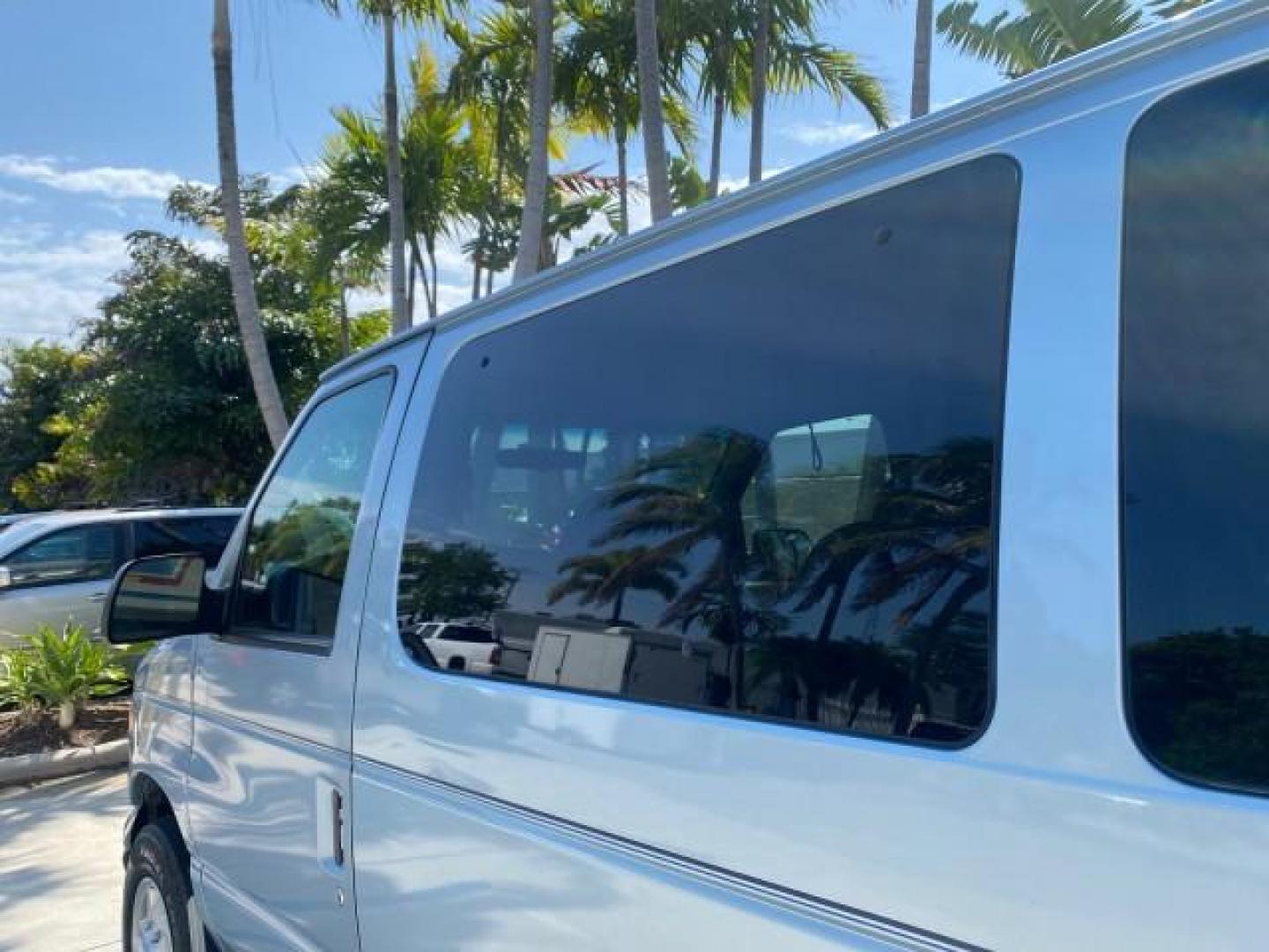 1999 Light Blue /Medium Parchment Ford Econoline Wagon XLT 15 PAS VAN EXT (1FBSS31S6XH) with an 6.8L EFI V10 Engine engine, Automatic transmission, located at 4701 North Dixie Hwy, Pompano Beach, FL, 33064, (954) 422-2889, 26.240938, -80.123474 - OUR WEBPAGE FLORIDACARS1.COM HAS OVER 100 PHOTOS AND FREE CARFAX LINK 1999 1999 FORD E-350 XL XLT SD 15 PASSENGER VIN: 1FBSS31S6XHB80914 VAN 6.8L V10 F SOHC 20V GASOLINE REAR WHEEL DRIVE Top Features Cloth Seats Basic Features ABS Brakes Air Conditioning Cassette Player Power Locks AM/FM Stereo Auto - Photo#58