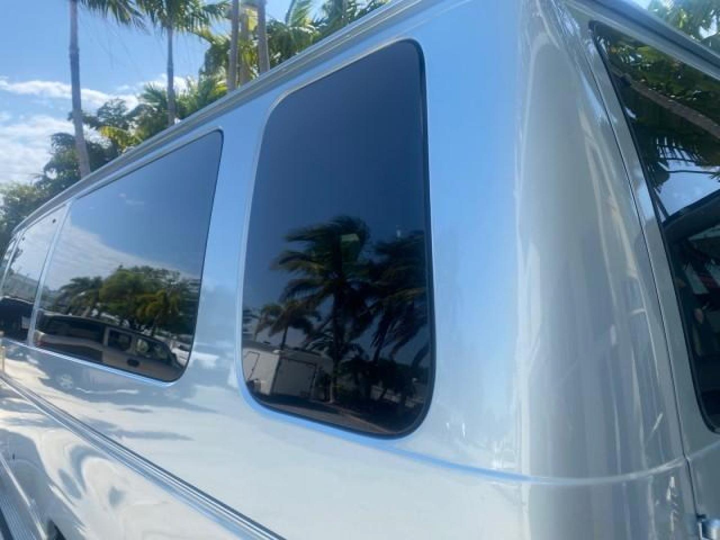 1999 Light Blue /Medium Parchment Ford Econoline Wagon XLT 15 PAS VAN EXT (1FBSS31S6XH) with an 6.8L EFI V10 Engine engine, Automatic transmission, located at 4701 North Dixie Hwy, Pompano Beach, FL, 33064, (954) 422-2889, 26.240938, -80.123474 - OUR WEBPAGE FLORIDACARS1.COM HAS OVER 100 PHOTOS AND FREE CARFAX LINK 1999 1999 FORD E-350 XL XLT SD 15 PASSENGER VIN: 1FBSS31S6XHB80914 VAN 6.8L V10 F SOHC 20V GASOLINE REAR WHEEL DRIVE Top Features Cloth Seats Basic Features ABS Brakes Air Conditioning Cassette Player Power Locks AM/FM Stereo Auto - Photo#65