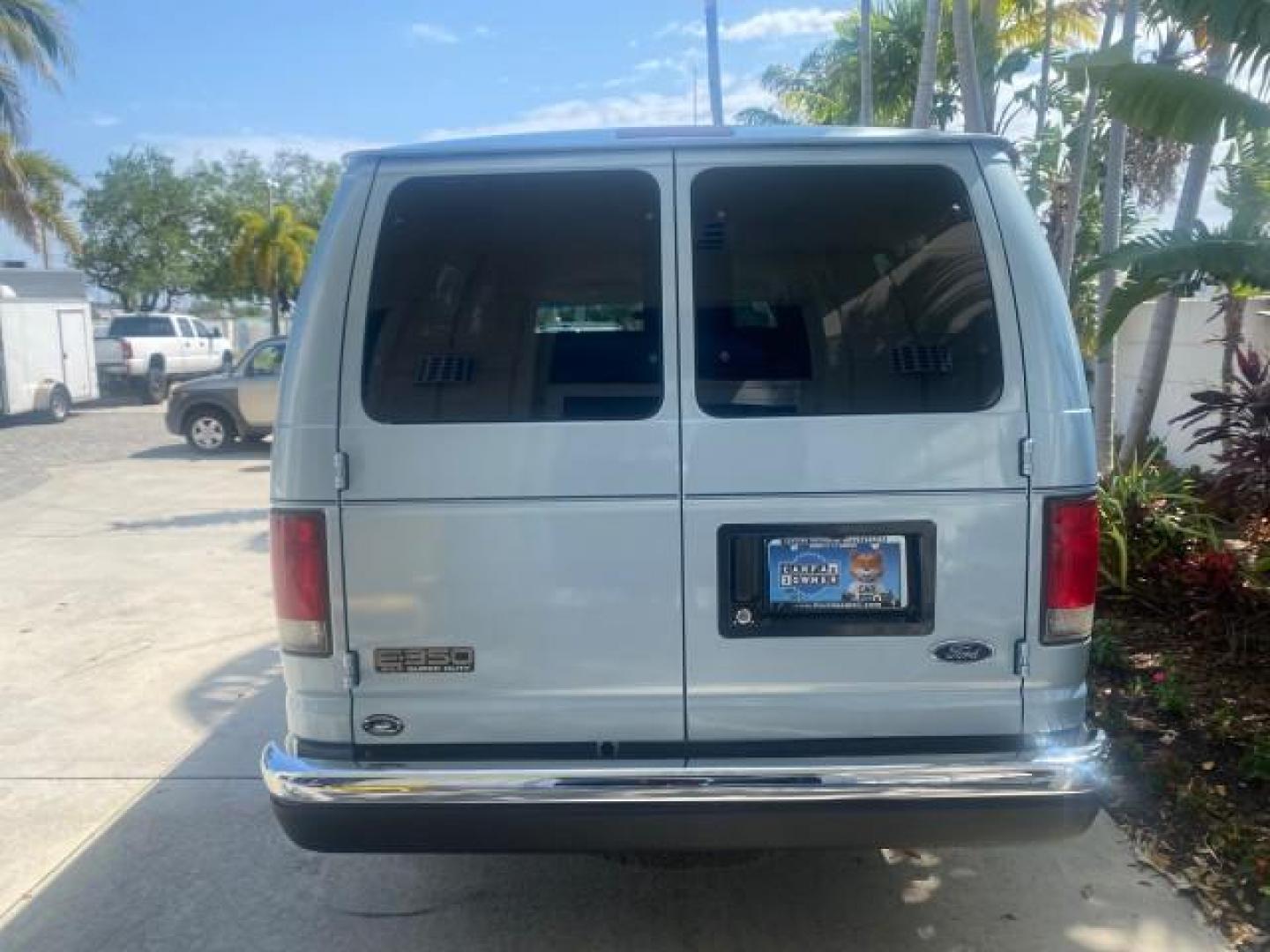 1999 Light Blue /Medium Parchment Ford Econoline Wagon XLT 15 PAS VAN EXT (1FBSS31S6XH) with an 6.8L EFI V10 Engine engine, Automatic transmission, located at 4701 North Dixie Hwy, Pompano Beach, FL, 33064, (954) 422-2889, 26.240938, -80.123474 - OUR WEBPAGE FLORIDACARS1.COM HAS OVER 100 PHOTOS AND FREE CARFAX LINK 1999 1999 FORD E-350 XL XLT SD 15 PASSENGER VIN: 1FBSS31S6XHB80914 VAN 6.8L V10 F SOHC 20V GASOLINE REAR WHEEL DRIVE Top Features Cloth Seats Basic Features ABS Brakes Air Conditioning Cassette Player Power Locks AM/FM Stereo Auto - Photo#68