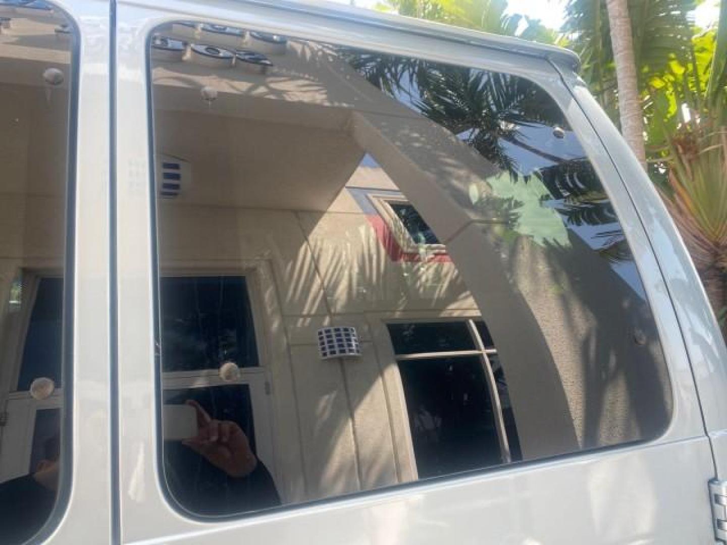 1999 Light Blue /Medium Parchment Ford Econoline Wagon XLT 15 PAS VAN EXT (1FBSS31S6XH) with an 6.8L EFI V10 Engine engine, Automatic transmission, located at 4701 North Dixie Hwy, Pompano Beach, FL, 33064, (954) 422-2889, 26.240938, -80.123474 - OUR WEBPAGE FLORIDACARS1.COM HAS OVER 100 PHOTOS AND FREE CARFAX LINK 1999 1999 FORD E-350 XL XLT SD 15 PASSENGER VIN: 1FBSS31S6XHB80914 VAN 6.8L V10 F SOHC 20V GASOLINE REAR WHEEL DRIVE Top Features Cloth Seats Basic Features ABS Brakes Air Conditioning Cassette Player Power Locks AM/FM Stereo Auto - Photo#70