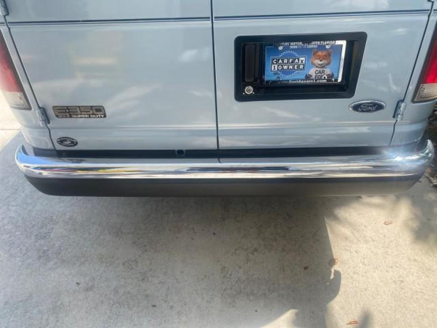 1999 Light Blue /Medium Parchment Ford Econoline Wagon XLT 15 PAS VAN EXT (1FBSS31S6XH) with an 6.8L EFI V10 Engine engine, Automatic transmission, located at 4701 North Dixie Hwy, Pompano Beach, FL, 33064, (954) 422-2889, 26.240938, -80.123474 - OUR WEBPAGE FLORIDACARS1.COM HAS OVER 100 PHOTOS AND FREE CARFAX LINK 1999 1999 FORD E-350 XL XLT SD 15 PASSENGER VIN: 1FBSS31S6XHB80914 VAN 6.8L V10 F SOHC 20V GASOLINE REAR WHEEL DRIVE Top Features Cloth Seats Basic Features ABS Brakes Air Conditioning Cassette Player Power Locks AM/FM Stereo Auto - Photo#73