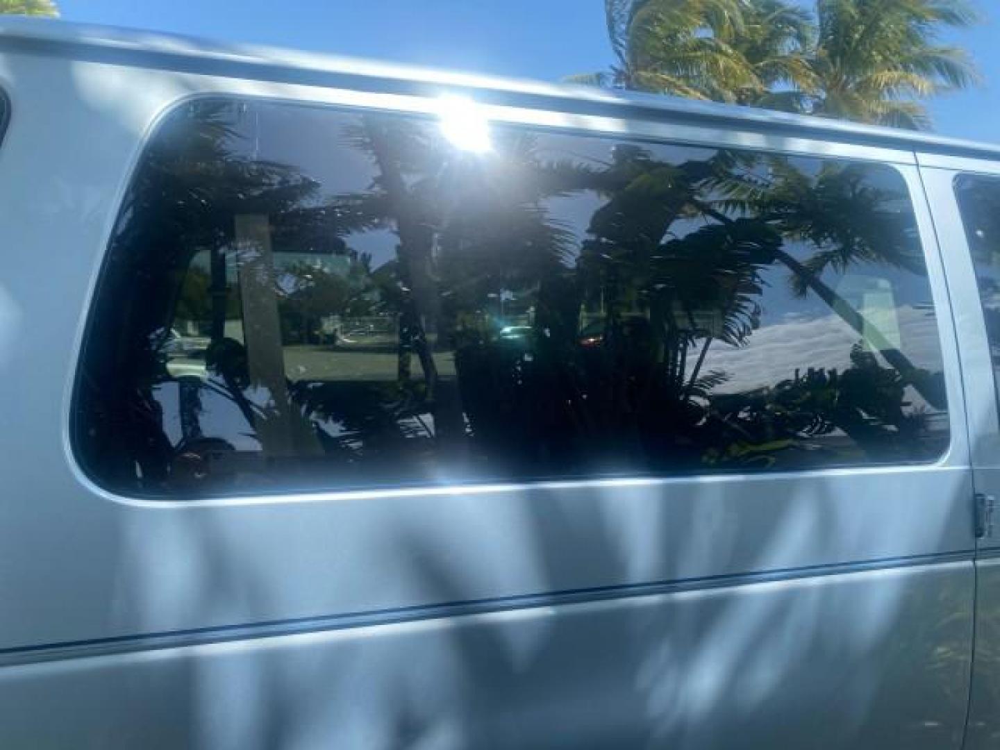 1999 Light Blue /Medium Parchment Ford Econoline Wagon XLT 15 PAS VAN EXT (1FBSS31S6XH) with an 6.8L EFI V10 Engine engine, Automatic transmission, located at 4701 North Dixie Hwy, Pompano Beach, FL, 33064, (954) 422-2889, 26.240938, -80.123474 - OUR WEBPAGE FLORIDACARS1.COM HAS OVER 100 PHOTOS AND FREE CARFAX LINK 1999 1999 FORD E-350 XL XLT SD 15 PASSENGER VIN: 1FBSS31S6XHB80914 VAN 6.8L V10 F SOHC 20V GASOLINE REAR WHEEL DRIVE Top Features Cloth Seats Basic Features ABS Brakes Air Conditioning Cassette Player Power Locks AM/FM Stereo Auto - Photo#77