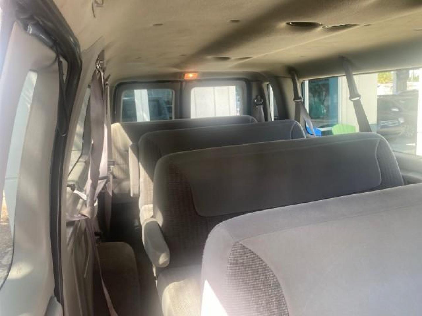 1999 Light Blue /Medium Parchment Ford Econoline Wagon XLT 15 PAS VAN EXT (1FBSS31S6XH) with an 6.8L EFI V10 Engine engine, Automatic transmission, located at 4701 North Dixie Hwy, Pompano Beach, FL, 33064, (954) 422-2889, 26.240938, -80.123474 - OUR WEBPAGE FLORIDACARS1.COM HAS OVER 100 PHOTOS AND FREE CARFAX LINK 1999 1999 FORD E-350 XL XLT SD 15 PASSENGER VIN: 1FBSS31S6XHB80914 VAN 6.8L V10 F SOHC 20V GASOLINE REAR WHEEL DRIVE Top Features Cloth Seats Basic Features ABS Brakes Air Conditioning Cassette Player Power Locks AM/FM Stereo Auto - Photo#88