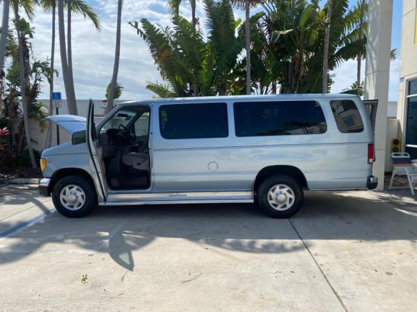 1999 Light Blue /Medium Parchment Ford Econoline Wagon XLT 15 PAS VAN EXT (1FBSS31S6XH) with an 6.8L EFI V10 Engine engine, Automatic transmission, located at 4701 North Dixie Hwy, Pompano Beach, FL, 33064, (954) 422-2889, 26.240938, -80.123474 - OUR WEBPAGE FLORIDACARS1.COM HAS OVER 100 PHOTOS AND FREE CARFAX LINK 1999 1999 FORD E-350 XL XLT SD 15 PASSENGER VIN: 1FBSS31S6XHB80914 VAN 6.8L V10 F SOHC 20V GASOLINE REAR WHEEL DRIVE Top Features Cloth Seats Basic Features ABS Brakes Air Conditioning Cassette Player Power Locks AM/FM Stereo Auto - Photo#8