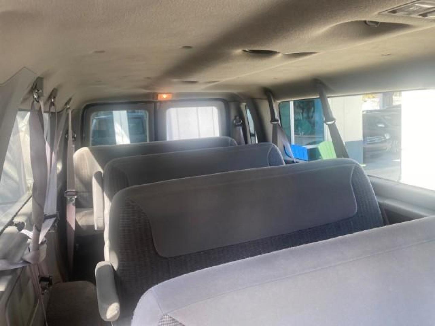 1999 Light Blue /Medium Parchment Ford Econoline Wagon XLT 15 PAS VAN EXT (1FBSS31S6XH) with an 6.8L EFI V10 Engine engine, Automatic transmission, located at 4701 North Dixie Hwy, Pompano Beach, FL, 33064, (954) 422-2889, 26.240938, -80.123474 - OUR WEBPAGE FLORIDACARS1.COM HAS OVER 100 PHOTOS AND FREE CARFAX LINK 1999 1999 FORD E-350 XL XLT SD 15 PASSENGER VIN: 1FBSS31S6XHB80914 VAN 6.8L V10 F SOHC 20V GASOLINE REAR WHEEL DRIVE Top Features Cloth Seats Basic Features ABS Brakes Air Conditioning Cassette Player Power Locks AM/FM Stereo Auto - Photo#89