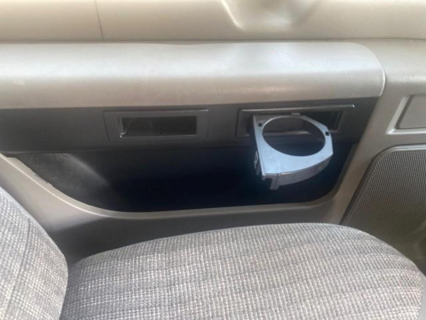 1999 Light Blue /Medium Parchment Ford Econoline Wagon XLT 15 PAS VAN EXT (1FBSS31S6XH) with an 6.8L EFI V10 Engine engine, Automatic transmission, located at 4701 North Dixie Hwy, Pompano Beach, FL, 33064, (954) 422-2889, 26.240938, -80.123474 - OUR WEBPAGE FLORIDACARS1.COM HAS OVER 100 PHOTOS AND FREE CARFAX LINK 1999 1999 FORD E-350 XL XLT SD 15 PASSENGER VIN: 1FBSS31S6XHB80914 VAN 6.8L V10 F SOHC 20V GASOLINE REAR WHEEL DRIVE Top Features Cloth Seats Basic Features ABS Brakes Air Conditioning Cassette Player Power Locks AM/FM Stereo Auto - Photo#93
