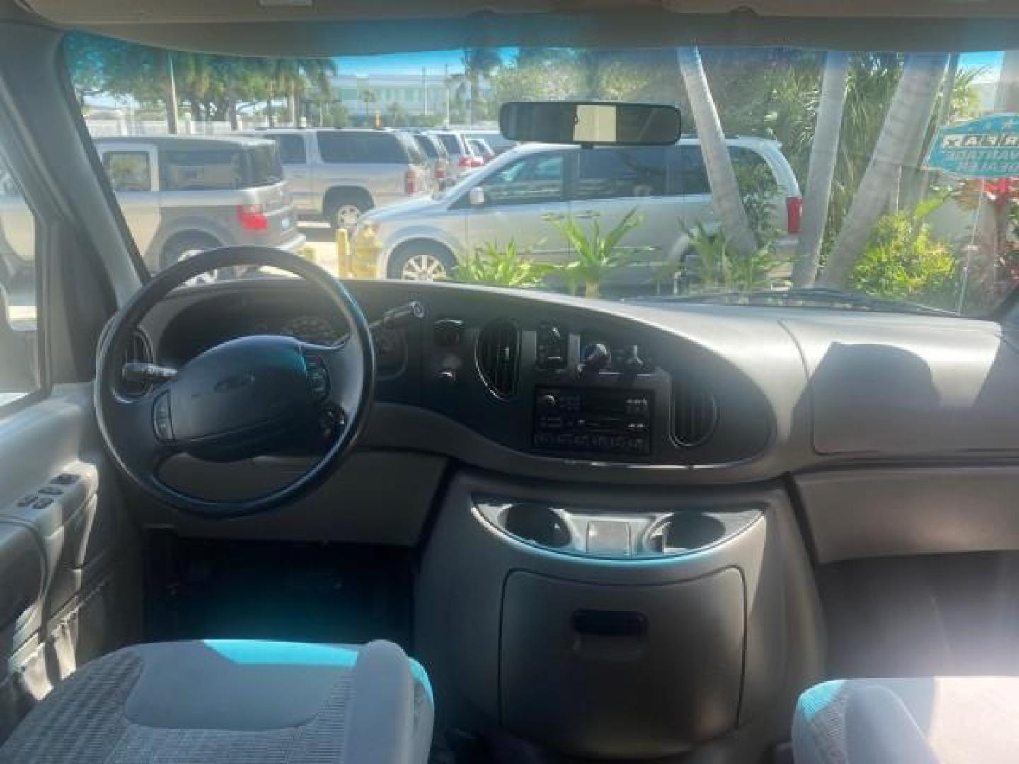 1999 Light Blue /Medium Parchment Ford Econoline Wagon XLT 15 PAS VAN EXT (1FBSS31S6XH) with an 6.8L EFI V10 Engine engine, Automatic transmission, located at 4701 North Dixie Hwy, Pompano Beach, FL, 33064, (954) 422-2889, 26.240938, -80.123474 - OUR WEBPAGE FLORIDACARS1.COM HAS OVER 100 PHOTOS AND FREE CARFAX LINK 1999 1999 FORD E-350 XL XLT SD 15 PASSENGER VIN: 1FBSS31S6XHB80914 VAN 6.8L V10 F SOHC 20V GASOLINE REAR WHEEL DRIVE Top Features Cloth Seats Basic Features ABS Brakes Air Conditioning Cassette Player Power Locks AM/FM Stereo Auto - Photo#94