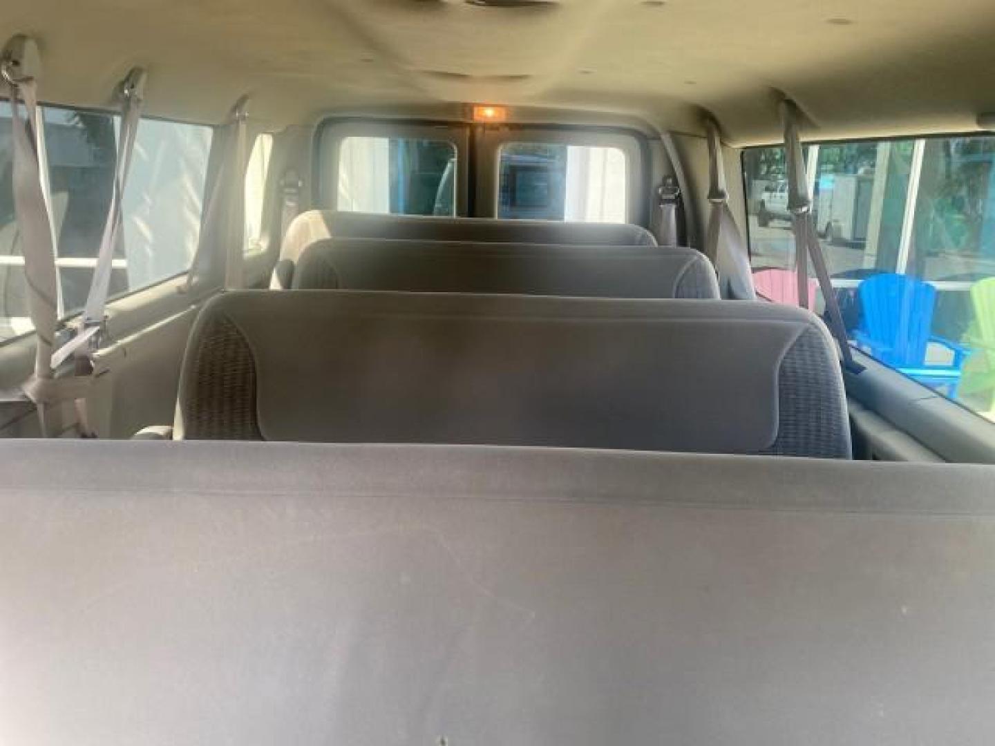 1999 Light Blue /Medium Parchment Ford Econoline Wagon XLT 15 PAS VAN EXT (1FBSS31S6XH) with an 6.8L EFI V10 Engine engine, Automatic transmission, located at 4701 North Dixie Hwy, Pompano Beach, FL, 33064, (954) 422-2889, 26.240938, -80.123474 - OUR WEBPAGE FLORIDACARS1.COM HAS OVER 100 PHOTOS AND FREE CARFAX LINK 1999 1999 FORD E-350 XL XLT SD 15 PASSENGER VIN: 1FBSS31S6XHB80914 VAN 6.8L V10 F SOHC 20V GASOLINE REAR WHEEL DRIVE Top Features Cloth Seats Basic Features ABS Brakes Air Conditioning Cassette Player Power Locks AM/FM Stereo Auto - Photo#95