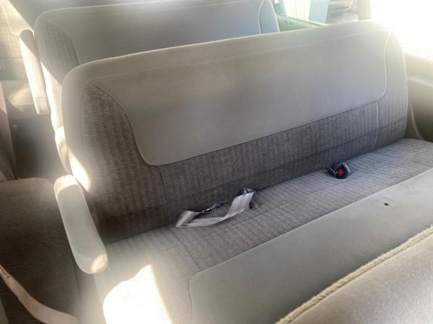 1999 Light Blue /Medium Parchment Ford Econoline Wagon XLT 15 PAS VAN EXT (1FBSS31S6XH) with an 6.8L EFI V10 Engine engine, Automatic transmission, located at 4701 North Dixie Hwy, Pompano Beach, FL, 33064, (954) 422-2889, 26.240938, -80.123474 - OUR WEBPAGE FLORIDACARS1.COM HAS OVER 100 PHOTOS AND FREE CARFAX LINK 1999 1999 FORD E-350 XL XLT SD 15 PASSENGER VIN: 1FBSS31S6XHB80914 VAN 6.8L V10 F SOHC 20V GASOLINE REAR WHEEL DRIVE Top Features Cloth Seats Basic Features ABS Brakes Air Conditioning Cassette Player Power Locks AM/FM Stereo Auto - Photo#98