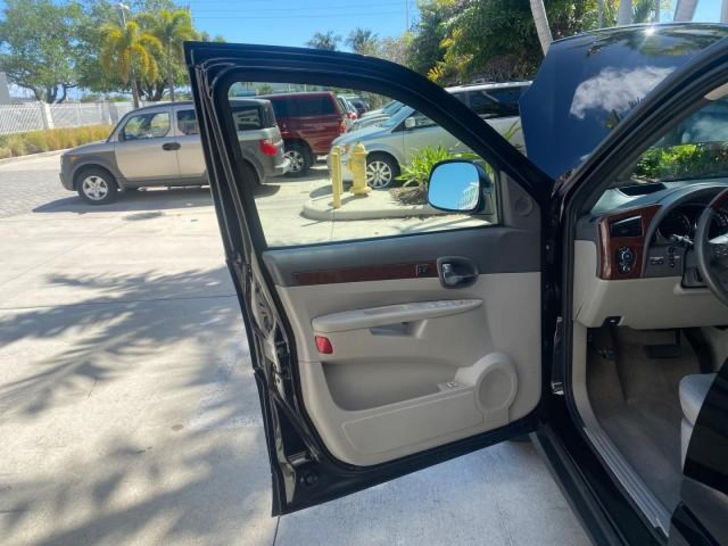2007 Black Onyx /Gray Buick Rendezvous CXL LOW MILES 33,014 3RD ROW (3G5DA03L47S) with an 3.5L V6 SFI Engine engine, Automatic transmission, located at 4701 North Dixie Hwy, Pompano Beach, FL, 33064, (954) 422-2889, 26.240938, -80.123474 - OUR WEBPAGE FLORIDACARS1.COM HAS OVER 100 PHOTOS AND FREE CARFAX LINK 2007 BUICK RENDEZVOUS CXL NEW $32,314 VIN: 3G5DA03L47S575376 3 G 5 D A 0 3 L 4 7 S 5 7 5 3 7 6 4 DOOR WAGON/SPORT UTILITY 3.5L V6 F 17 INCH CHROME RIMS GASOLINE FRONT WHEEL DRIVE Highlighted Features Heated Seats Leather Seats AM/ - Photo#9