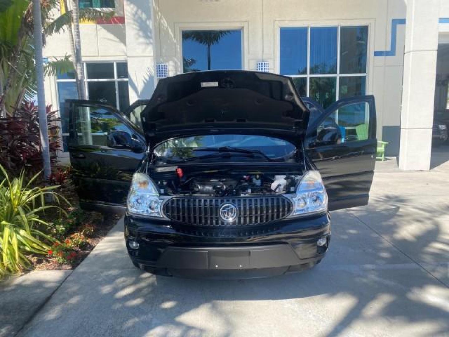 2007 Black Onyx /Gray Buick Rendezvous CXL LOW MILES 33,014 3RD ROW (3G5DA03L47S) with an 3.5L V6 SFI Engine engine, Automatic transmission, located at 4701 North Dixie Hwy, Pompano Beach, FL, 33064, (954) 422-2889, 26.240938, -80.123474 - OUR WEBPAGE FLORIDACARS1.COM HAS OVER 100 PHOTOS AND FREE CARFAX LINK 2007 BUICK RENDEZVOUS CXL NEW $32,314 VIN: 3G5DA03L47S575376 3 G 5 D A 0 3 L 4 7 S 5 7 5 3 7 6 4 DOOR WAGON/SPORT UTILITY 3.5L V6 F 17 INCH CHROME RIMS GASOLINE FRONT WHEEL DRIVE Highlighted Features Heated Seats Leather Seats AM/ - Photo#16