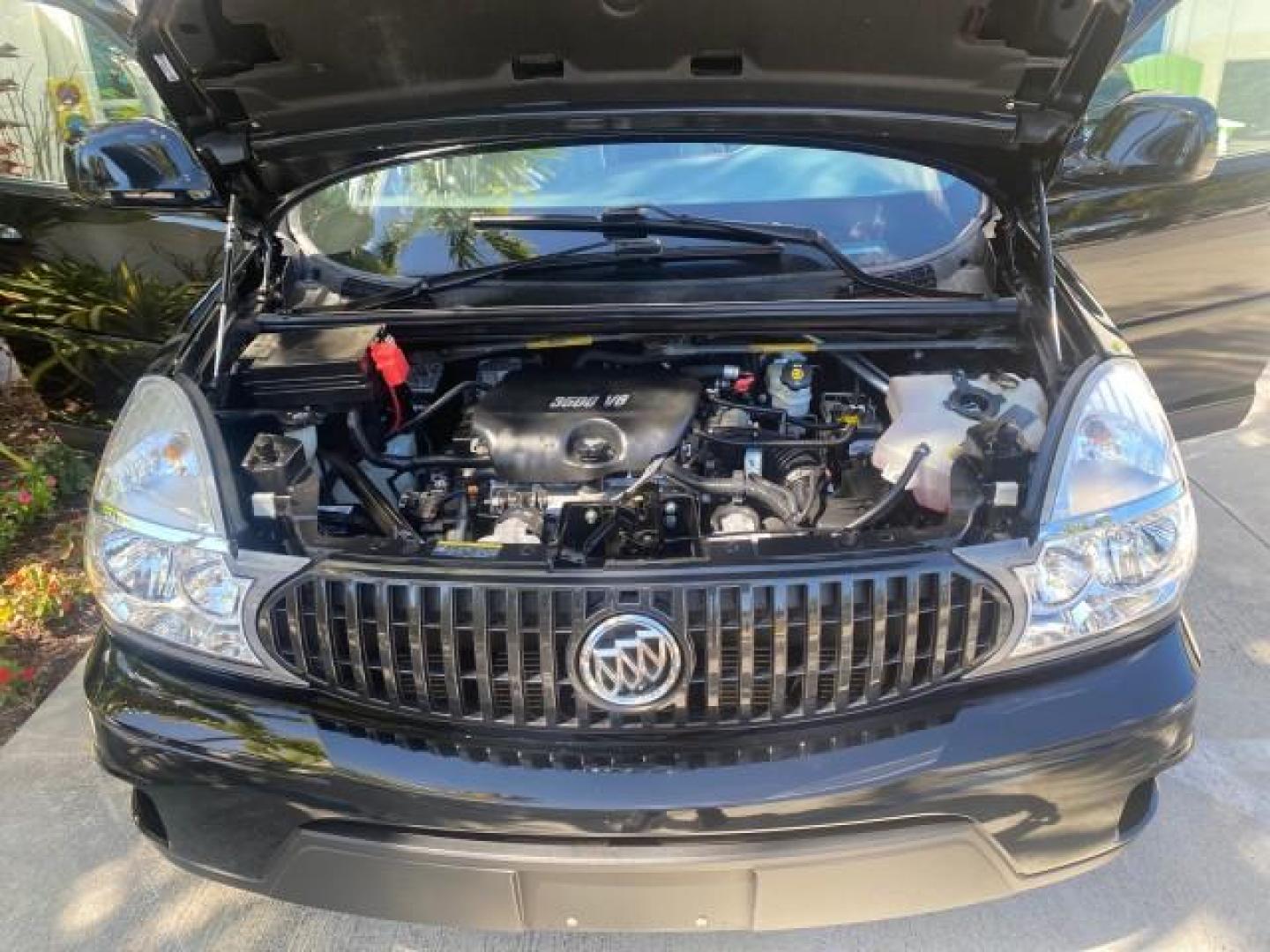 2007 Black Onyx /Gray Buick Rendezvous CXL LOW MILES 33,014 3RD ROW (3G5DA03L47S) with an 3.5L V6 SFI Engine engine, Automatic transmission, located at 4701 North Dixie Hwy, Pompano Beach, FL, 33064, (954) 422-2889, 26.240938, -80.123474 - OUR WEBPAGE FLORIDACARS1.COM HAS OVER 100 PHOTOS AND FREE CARFAX LINK 2007 BUICK RENDEZVOUS CXL NEW $32,314 VIN: 3G5DA03L47S575376 3 G 5 D A 0 3 L 4 7 S 5 7 5 3 7 6 4 DOOR WAGON/SPORT UTILITY 3.5L V6 F 17 INCH CHROME RIMS GASOLINE FRONT WHEEL DRIVE Highlighted Features Heated Seats Leather Seats AM/ - Photo#17