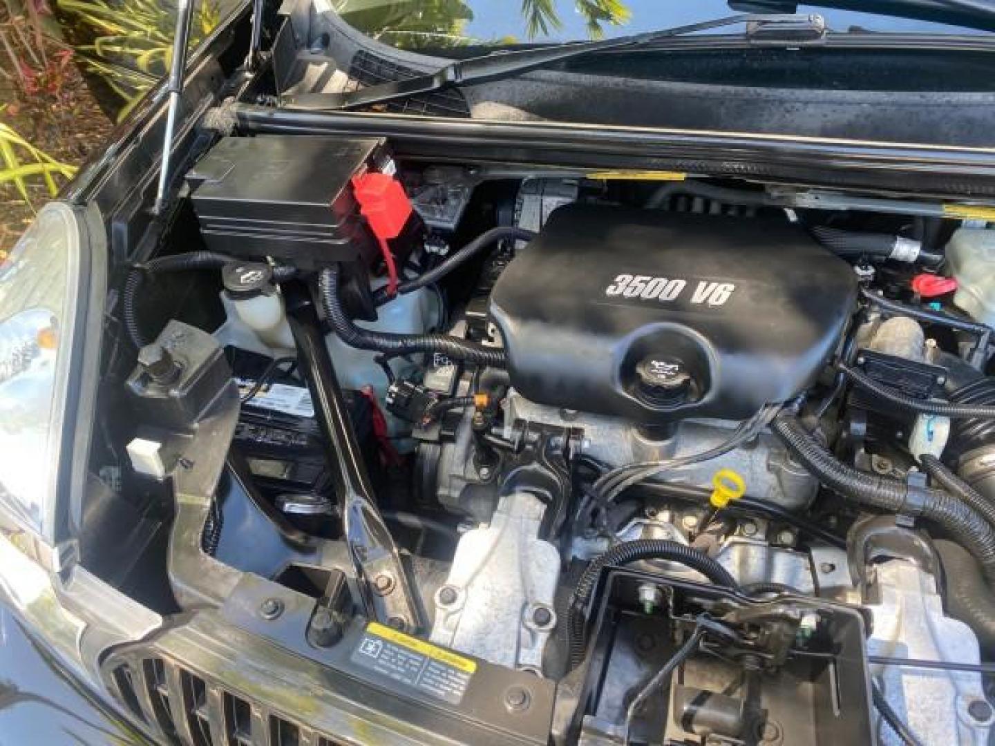 2007 Black Onyx /Gray Buick Rendezvous CXL LOW MILES 33,014 3RD ROW (3G5DA03L47S) with an 3.5L V6 SFI Engine engine, Automatic transmission, located at 4701 North Dixie Hwy, Pompano Beach, FL, 33064, (954) 422-2889, 26.240938, -80.123474 - OUR WEBPAGE FLORIDACARS1.COM HAS OVER 100 PHOTOS AND FREE CARFAX LINK 2007 BUICK RENDEZVOUS CXL NEW $32,314 VIN: 3G5DA03L47S575376 3 G 5 D A 0 3 L 4 7 S 5 7 5 3 7 6 4 DOOR WAGON/SPORT UTILITY 3.5L V6 F 17 INCH CHROME RIMS GASOLINE FRONT WHEEL DRIVE Highlighted Features Heated Seats Leather Seats AM/ - Photo#24