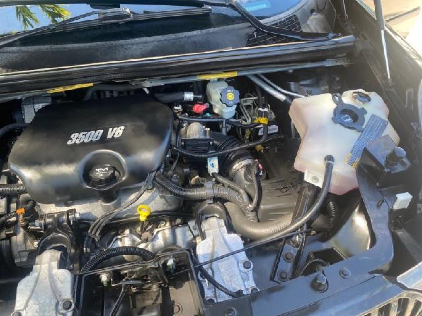 2007 Black Onyx /Gray Buick Rendezvous CXL LOW MILES 33,014 3RD ROW (3G5DA03L47S) with an 3.5L V6 SFI Engine engine, Automatic transmission, located at 4701 North Dixie Hwy, Pompano Beach, FL, 33064, (954) 422-2889, 26.240938, -80.123474 - OUR WEBPAGE FLORIDACARS1.COM HAS OVER 100 PHOTOS AND FREE CARFAX LINK 2007 BUICK RENDEZVOUS CXL NEW $32,314 VIN: 3G5DA03L47S575376 3 G 5 D A 0 3 L 4 7 S 5 7 5 3 7 6 4 DOOR WAGON/SPORT UTILITY 3.5L V6 F 17 INCH CHROME RIMS GASOLINE FRONT WHEEL DRIVE Highlighted Features Heated Seats Leather Seats AM/ - Photo#25