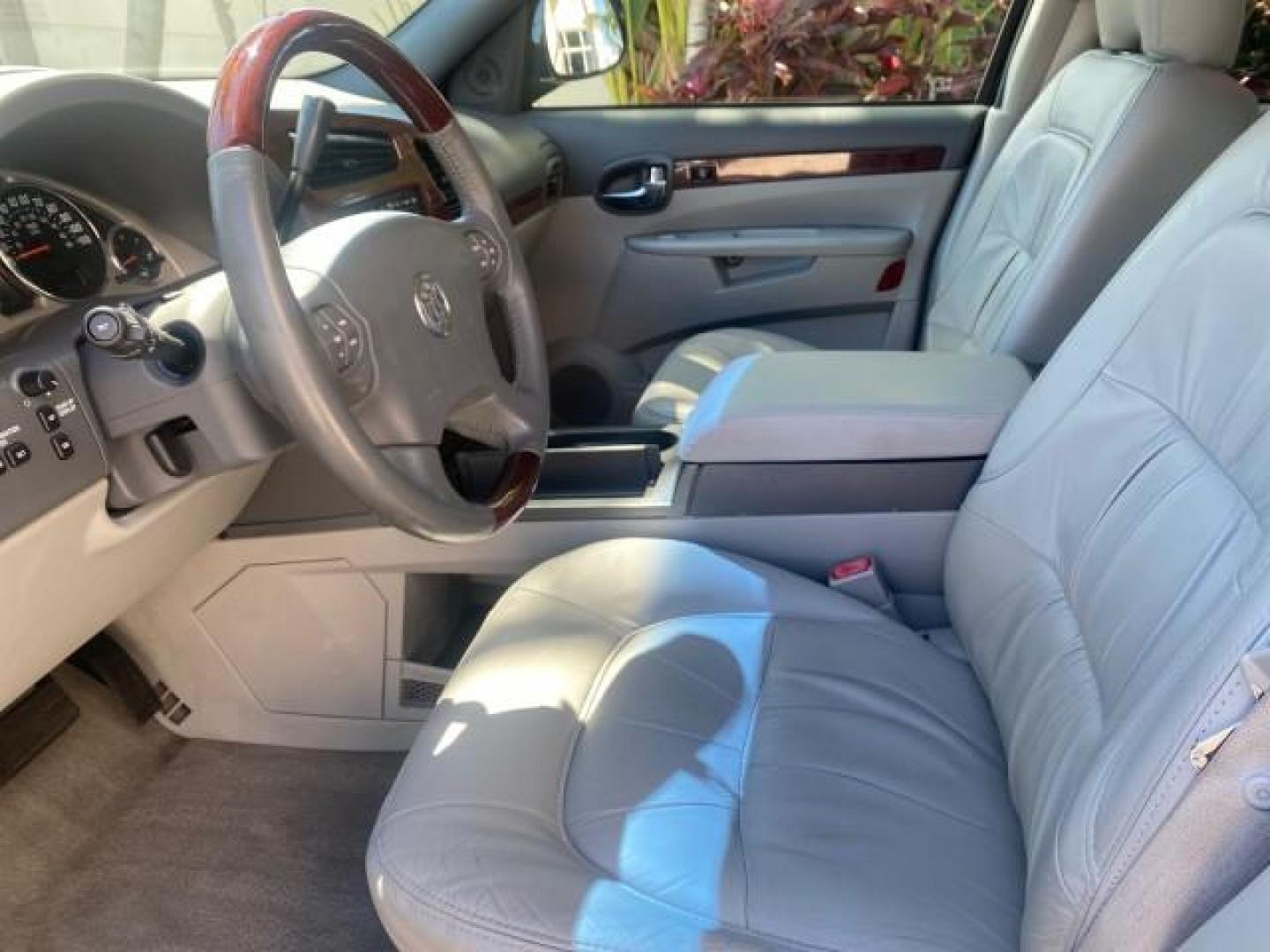 2007 Black Onyx /Gray Buick Rendezvous CXL LOW MILES 33,014 3RD ROW (3G5DA03L47S) with an 3.5L V6 SFI Engine engine, Automatic transmission, located at 4701 North Dixie Hwy, Pompano Beach, FL, 33064, (954) 422-2889, 26.240938, -80.123474 - OUR WEBPAGE FLORIDACARS1.COM HAS OVER 100 PHOTOS AND FREE CARFAX LINK 2007 BUICK RENDEZVOUS CXL NEW $32,314 VIN: 3G5DA03L47S575376 3 G 5 D A 0 3 L 4 7 S 5 7 5 3 7 6 4 DOOR WAGON/SPORT UTILITY 3.5L V6 F 17 INCH CHROME RIMS GASOLINE FRONT WHEEL DRIVE Highlighted Features Heated Seats Leather Seats AM/ - Photo#30