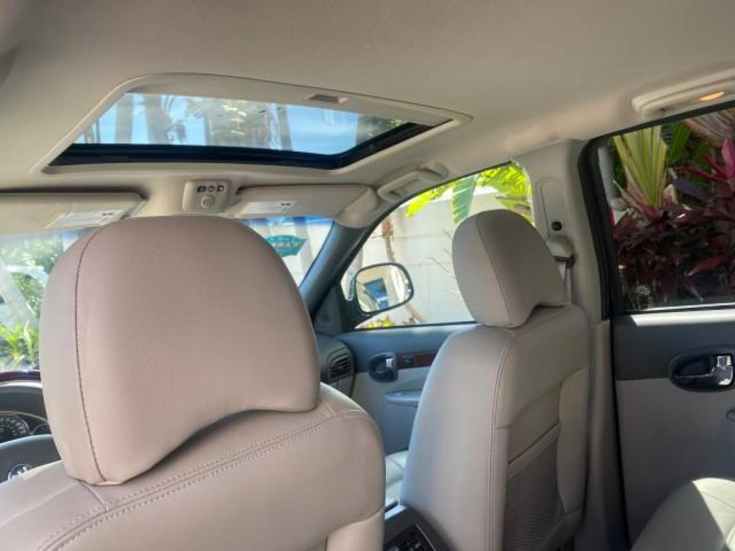 2007 Black Onyx /Gray Buick Rendezvous CXL LOW MILES 33,014 3RD ROW (3G5DA03L47S) with an 3.5L V6 SFI Engine engine, Automatic transmission, located at 4701 North Dixie Hwy, Pompano Beach, FL, 33064, (954) 422-2889, 26.240938, -80.123474 - OUR WEBPAGE FLORIDACARS1.COM HAS OVER 100 PHOTOS AND FREE CARFAX LINK 2007 BUICK RENDEZVOUS CXL NEW $32,314 VIN: 3G5DA03L47S575376 3 G 5 D A 0 3 L 4 7 S 5 7 5 3 7 6 4 DOOR WAGON/SPORT UTILITY 3.5L V6 F 17 INCH CHROME RIMS GASOLINE FRONT WHEEL DRIVE Highlighted Features Heated Seats Leather Seats AM/ - Photo#58