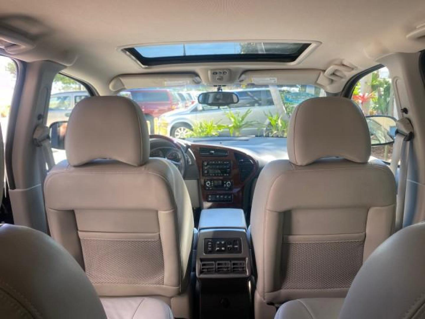 2007 Black Onyx /Gray Buick Rendezvous CXL LOW MILES 33,014 3RD ROW (3G5DA03L47S) with an 3.5L V6 SFI Engine engine, Automatic transmission, located at 4701 North Dixie Hwy, Pompano Beach, FL, 33064, (954) 422-2889, 26.240938, -80.123474 - OUR WEBPAGE FLORIDACARS1.COM HAS OVER 100 PHOTOS AND FREE CARFAX LINK 2007 BUICK RENDEZVOUS CXL NEW $32,314 VIN: 3G5DA03L47S575376 3 G 5 D A 0 3 L 4 7 S 5 7 5 3 7 6 4 DOOR WAGON/SPORT UTILITY 3.5L V6 F 17 INCH CHROME RIMS GASOLINE FRONT WHEEL DRIVE Highlighted Features Heated Seats Leather Seats AM/ - Photo#65