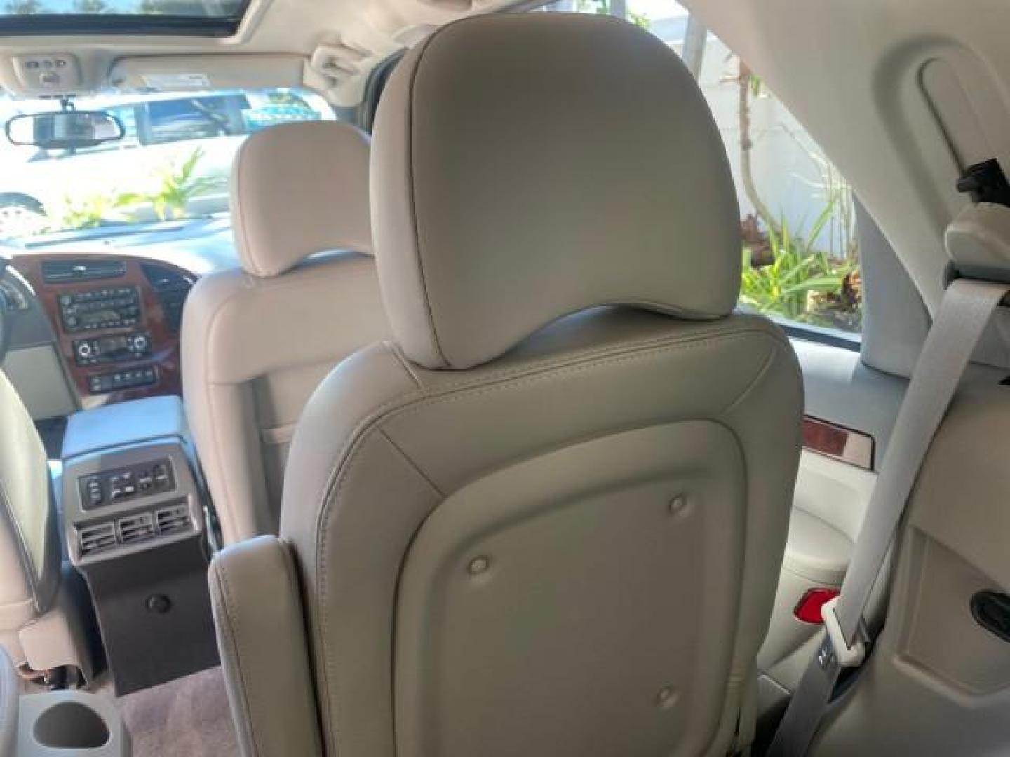 2007 Black Onyx /Gray Buick Rendezvous CXL LOW MILES 33,014 3RD ROW (3G5DA03L47S) with an 3.5L V6 SFI Engine engine, Automatic transmission, located at 4701 North Dixie Hwy, Pompano Beach, FL, 33064, (954) 422-2889, 26.240938, -80.123474 - OUR WEBPAGE FLORIDACARS1.COM HAS OVER 100 PHOTOS AND FREE CARFAX LINK 2007 BUICK RENDEZVOUS CXL NEW $32,314 VIN: 3G5DA03L47S575376 3 G 5 D A 0 3 L 4 7 S 5 7 5 3 7 6 4 DOOR WAGON/SPORT UTILITY 3.5L V6 F 17 INCH CHROME RIMS GASOLINE FRONT WHEEL DRIVE Highlighted Features Heated Seats Leather Seats AM/ - Photo#67