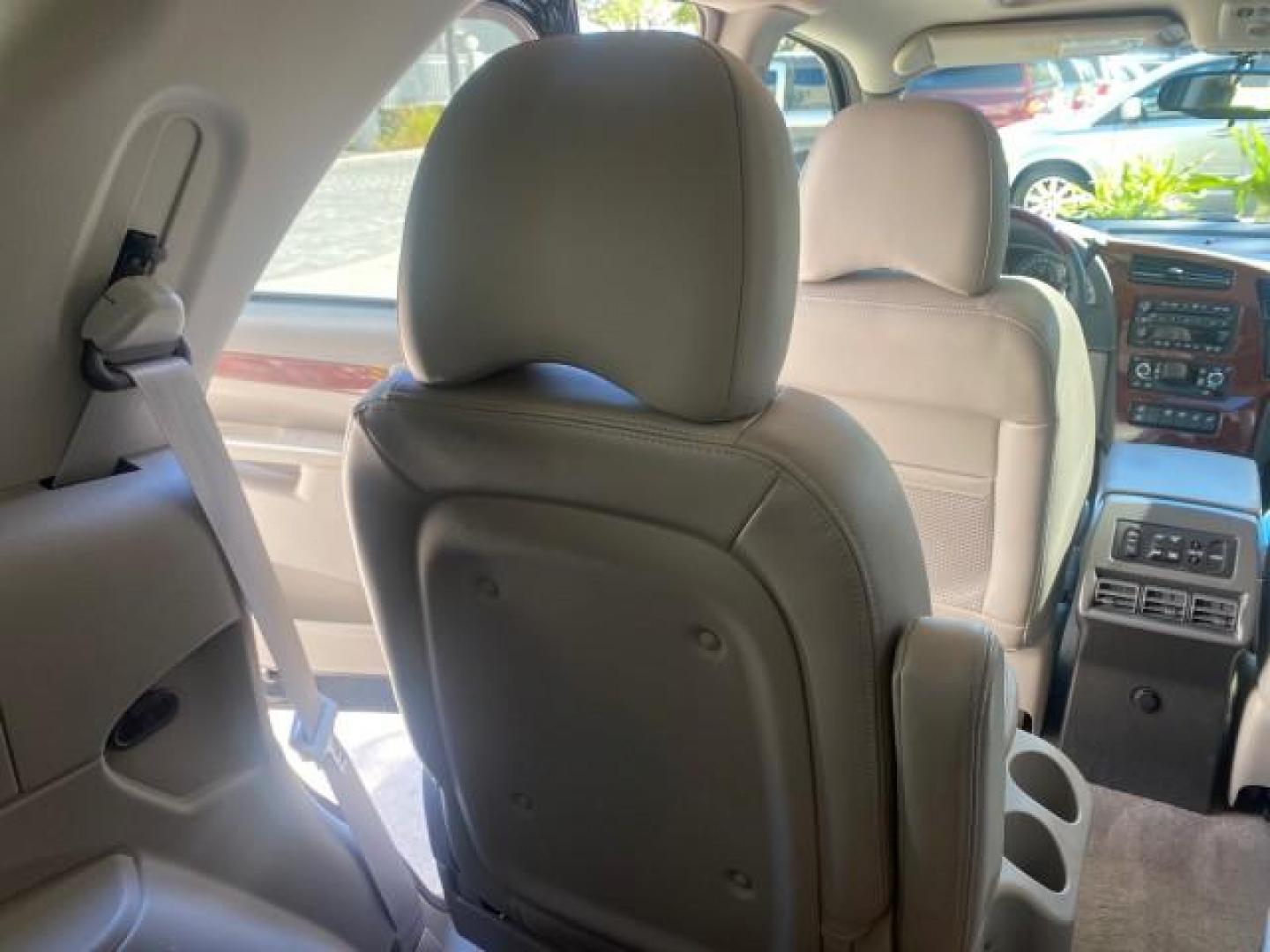 2007 Black Onyx /Gray Buick Rendezvous CXL LOW MILES 33,014 3RD ROW (3G5DA03L47S) with an 3.5L V6 SFI Engine engine, Automatic transmission, located at 4701 North Dixie Hwy, Pompano Beach, FL, 33064, (954) 422-2889, 26.240938, -80.123474 - OUR WEBPAGE FLORIDACARS1.COM HAS OVER 100 PHOTOS AND FREE CARFAX LINK 2007 BUICK RENDEZVOUS CXL NEW $32,314 VIN: 3G5DA03L47S575376 3 G 5 D A 0 3 L 4 7 S 5 7 5 3 7 6 4 DOOR WAGON/SPORT UTILITY 3.5L V6 F 17 INCH CHROME RIMS GASOLINE FRONT WHEEL DRIVE Highlighted Features Heated Seats Leather Seats AM/ - Photo#68