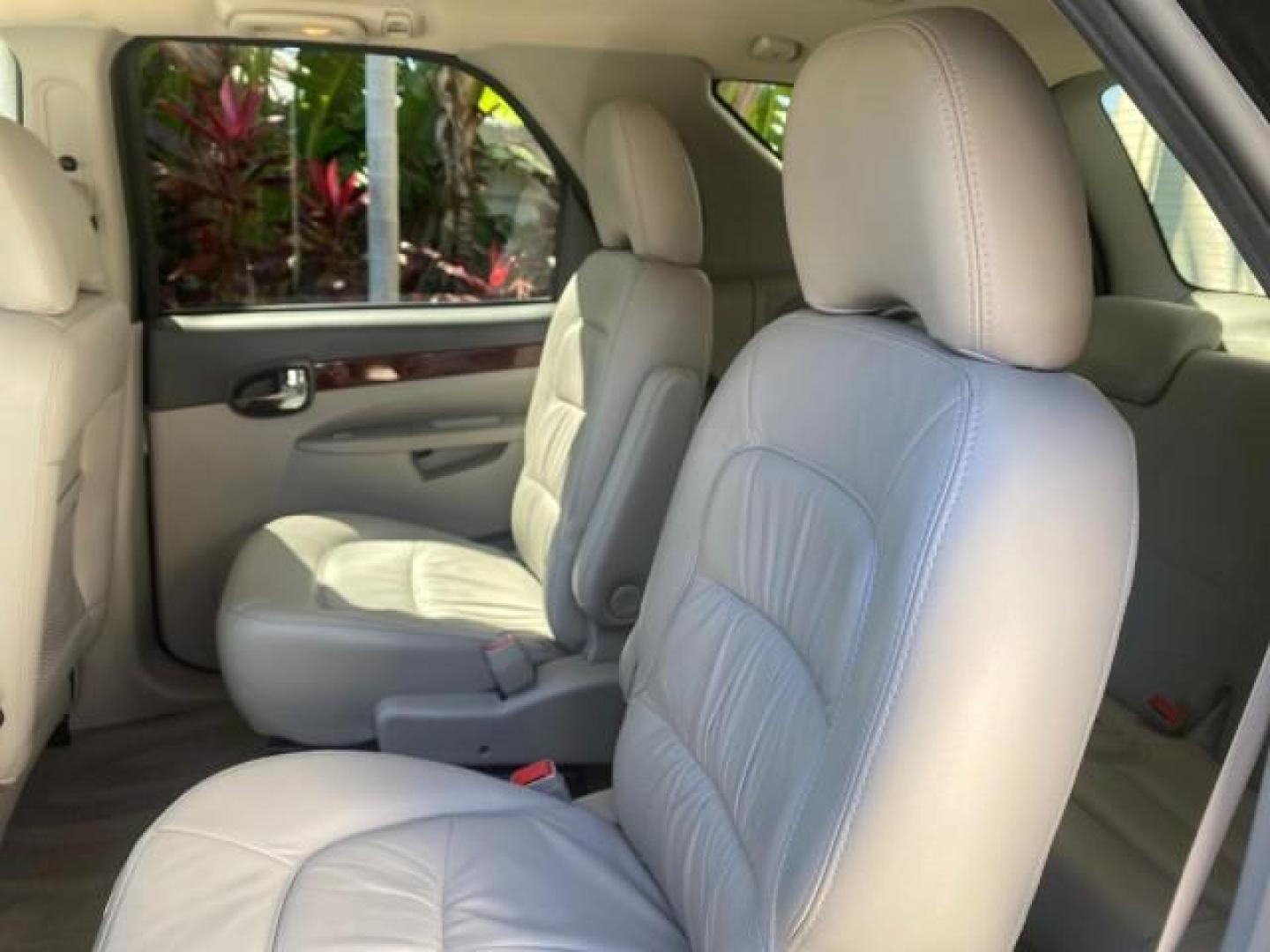 2007 Black Onyx /Gray Buick Rendezvous CXL LOW MILES 33,014 3RD ROW (3G5DA03L47S) with an 3.5L V6 SFI Engine engine, Automatic transmission, located at 4701 North Dixie Hwy, Pompano Beach, FL, 33064, (954) 422-2889, 26.240938, -80.123474 - OUR WEBPAGE FLORIDACARS1.COM HAS OVER 100 PHOTOS AND FREE CARFAX LINK 2007 BUICK RENDEZVOUS CXL NEW $32,314 VIN: 3G5DA03L47S575376 3 G 5 D A 0 3 L 4 7 S 5 7 5 3 7 6 4 DOOR WAGON/SPORT UTILITY 3.5L V6 F 17 INCH CHROME RIMS GASOLINE FRONT WHEEL DRIVE Highlighted Features Heated Seats Leather Seats AM/ - Photo#69