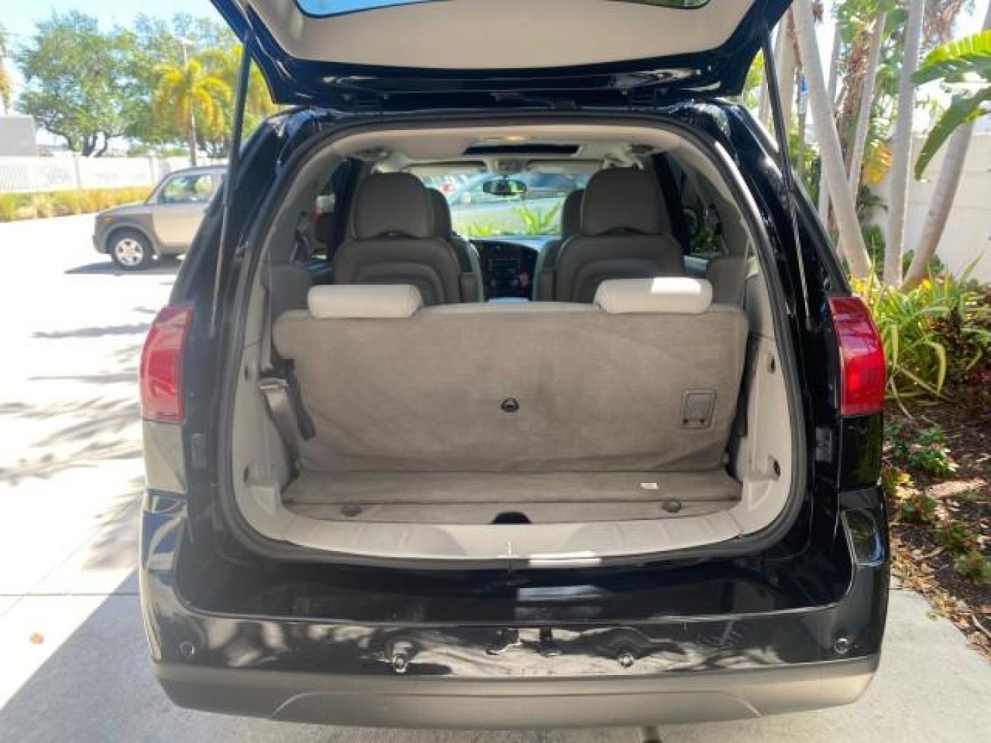 2007 Black Onyx /Gray Buick Rendezvous CXL LOW MILES 33,014 3RD ROW (3G5DA03L47S) with an 3.5L V6 SFI Engine engine, Automatic transmission, located at 4701 North Dixie Hwy, Pompano Beach, FL, 33064, (954) 422-2889, 26.240938, -80.123474 - OUR WEBPAGE FLORIDACARS1.COM HAS OVER 100 PHOTOS AND FREE CARFAX LINK 2007 BUICK RENDEZVOUS CXL NEW $32,314 VIN: 3G5DA03L47S575376 3 G 5 D A 0 3 L 4 7 S 5 7 5 3 7 6 4 DOOR WAGON/SPORT UTILITY 3.5L V6 F 17 INCH CHROME RIMS GASOLINE FRONT WHEEL DRIVE Highlighted Features Heated Seats Leather Seats AM/ - Photo#77