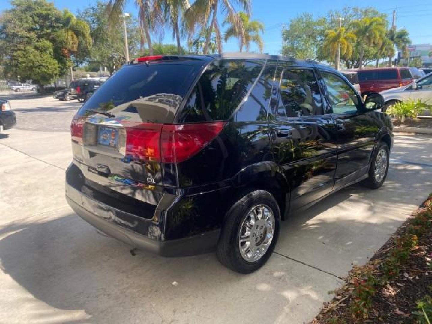 2007 Black Onyx /Gray Buick Rendezvous CXL LOW MILES 33,014 3RD ROW (3G5DA03L47S) with an 3.5L V6 SFI Engine engine, Automatic transmission, located at 4701 North Dixie Hwy, Pompano Beach, FL, 33064, (954) 422-2889, 26.240938, -80.123474 - OUR WEBPAGE FLORIDACARS1.COM HAS OVER 100 PHOTOS AND FREE CARFAX LINK 2007 BUICK RENDEZVOUS CXL NEW $32,314 VIN: 3G5DA03L47S575376 3 G 5 D A 0 3 L 4 7 S 5 7 5 3 7 6 4 DOOR WAGON/SPORT UTILITY 3.5L V6 F 17 INCH CHROME RIMS GASOLINE FRONT WHEEL DRIVE Highlighted Features Heated Seats Leather Seats AM/ - Photo#7