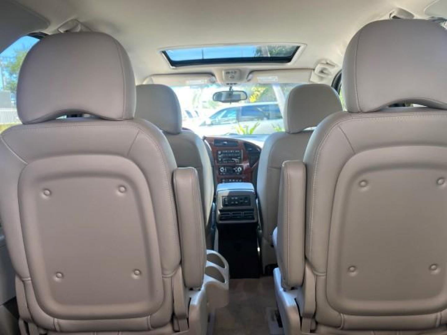 2007 Black Onyx /Gray Buick Rendezvous CXL LOW MILES 33,014 3RD ROW (3G5DA03L47S) with an 3.5L V6 SFI Engine engine, Automatic transmission, located at 4701 North Dixie Hwy, Pompano Beach, FL, 33064, (954) 422-2889, 26.240938, -80.123474 - OUR WEBPAGE FLORIDACARS1.COM HAS OVER 100 PHOTOS AND FREE CARFAX LINK 2007 BUICK RENDEZVOUS CXL NEW $32,314 VIN: 3G5DA03L47S575376 3 G 5 D A 0 3 L 4 7 S 5 7 5 3 7 6 4 DOOR WAGON/SPORT UTILITY 3.5L V6 F 17 INCH CHROME RIMS GASOLINE FRONT WHEEL DRIVE Highlighted Features Heated Seats Leather Seats AM/ - Photo#79