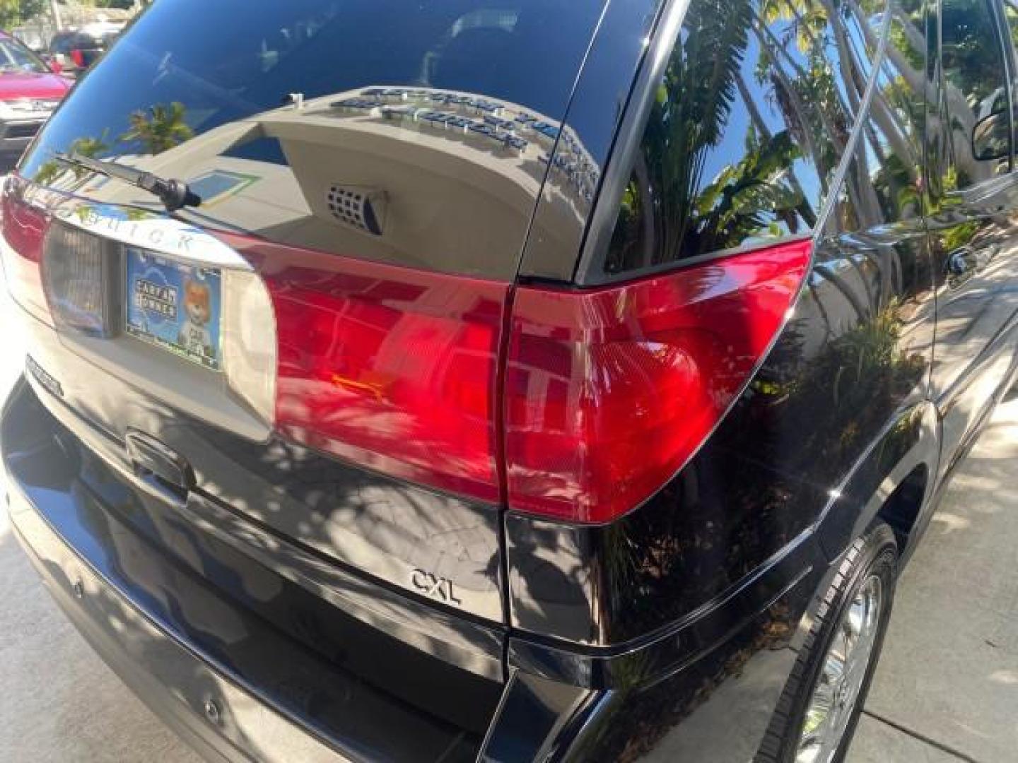 2007 Black Onyx /Gray Buick Rendezvous CXL LOW MILES 33,014 3RD ROW (3G5DA03L47S) with an 3.5L V6 SFI Engine engine, Automatic transmission, located at 4701 North Dixie Hwy, Pompano Beach, FL, 33064, (954) 422-2889, 26.240938, -80.123474 - OUR WEBPAGE FLORIDACARS1.COM HAS OVER 100 PHOTOS AND FREE CARFAX LINK 2007 BUICK RENDEZVOUS CXL NEW $32,314 VIN: 3G5DA03L47S575376 3 G 5 D A 0 3 L 4 7 S 5 7 5 3 7 6 4 DOOR WAGON/SPORT UTILITY 3.5L V6 F 17 INCH CHROME RIMS GASOLINE FRONT WHEEL DRIVE Highlighted Features Heated Seats Leather Seats AM/ - Photo#81