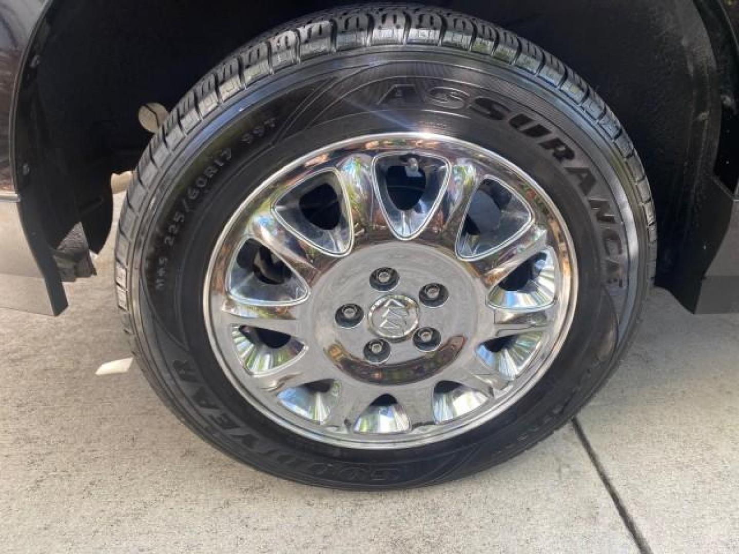2007 Black Onyx /Gray Buick Rendezvous CXL LOW MILES 33,014 3RD ROW (3G5DA03L47S) with an 3.5L V6 SFI Engine engine, Automatic transmission, located at 4701 North Dixie Hwy, Pompano Beach, FL, 33064, (954) 422-2889, 26.240938, -80.123474 - OUR WEBPAGE FLORIDACARS1.COM HAS OVER 100 PHOTOS AND FREE CARFAX LINK 2007 BUICK RENDEZVOUS CXL NEW $32,314 VIN: 3G5DA03L47S575376 3 G 5 D A 0 3 L 4 7 S 5 7 5 3 7 6 4 DOOR WAGON/SPORT UTILITY 3.5L V6 F 17 INCH CHROME RIMS GASOLINE FRONT WHEEL DRIVE Highlighted Features Heated Seats Leather Seats AM/ - Photo#82