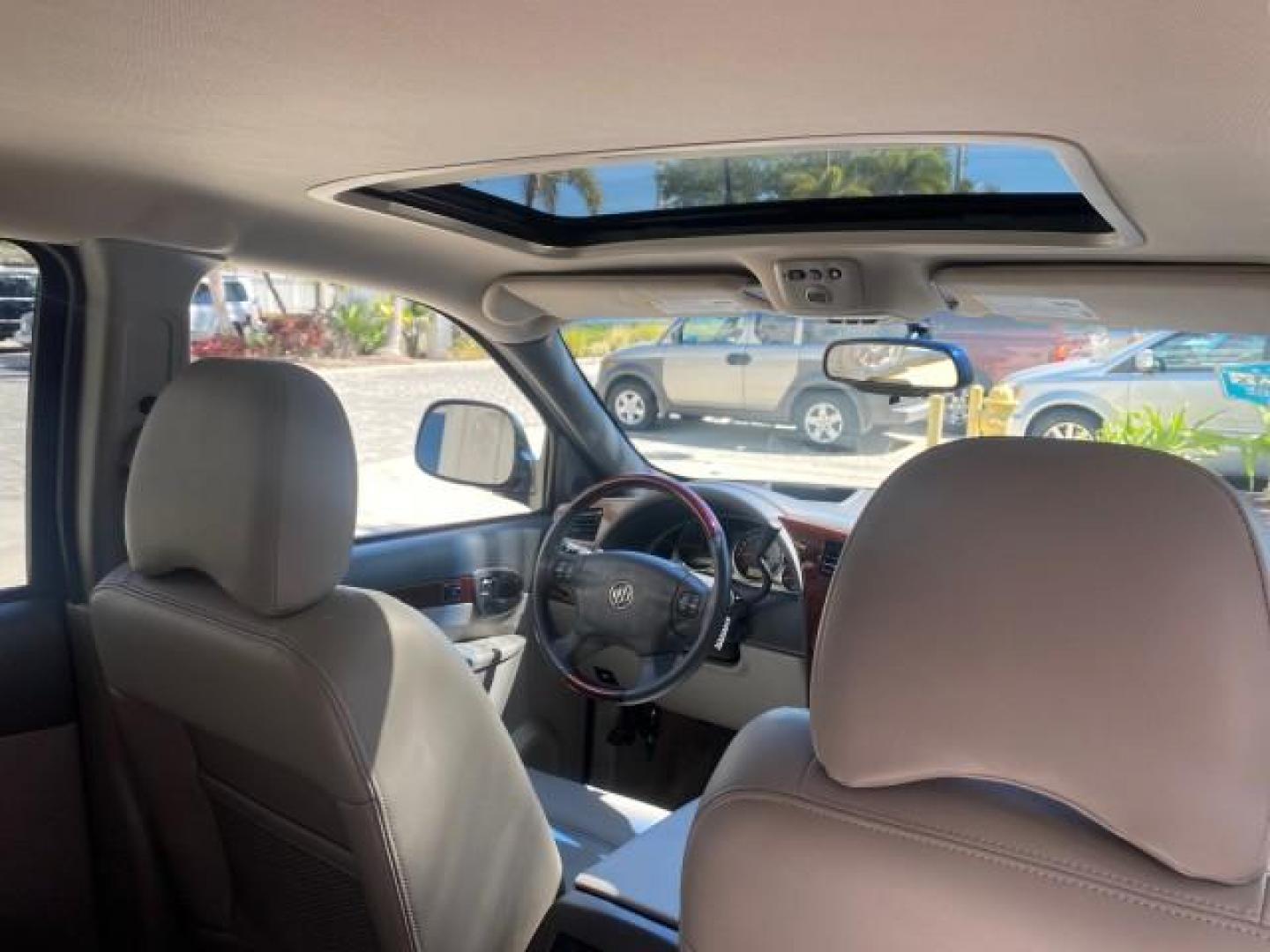 2007 Black Onyx /Gray Buick Rendezvous CXL LOW MILES 33,014 3RD ROW (3G5DA03L47S) with an 3.5L V6 SFI Engine engine, Automatic transmission, located at 4701 North Dixie Hwy, Pompano Beach, FL, 33064, (954) 422-2889, 26.240938, -80.123474 - OUR WEBPAGE FLORIDACARS1.COM HAS OVER 100 PHOTOS AND FREE CARFAX LINK 2007 BUICK RENDEZVOUS CXL NEW $32,314 VIN: 3G5DA03L47S575376 3 G 5 D A 0 3 L 4 7 S 5 7 5 3 7 6 4 DOOR WAGON/SPORT UTILITY 3.5L V6 F 17 INCH CHROME RIMS GASOLINE FRONT WHEEL DRIVE Highlighted Features Heated Seats Leather Seats AM/ - Photo#91
