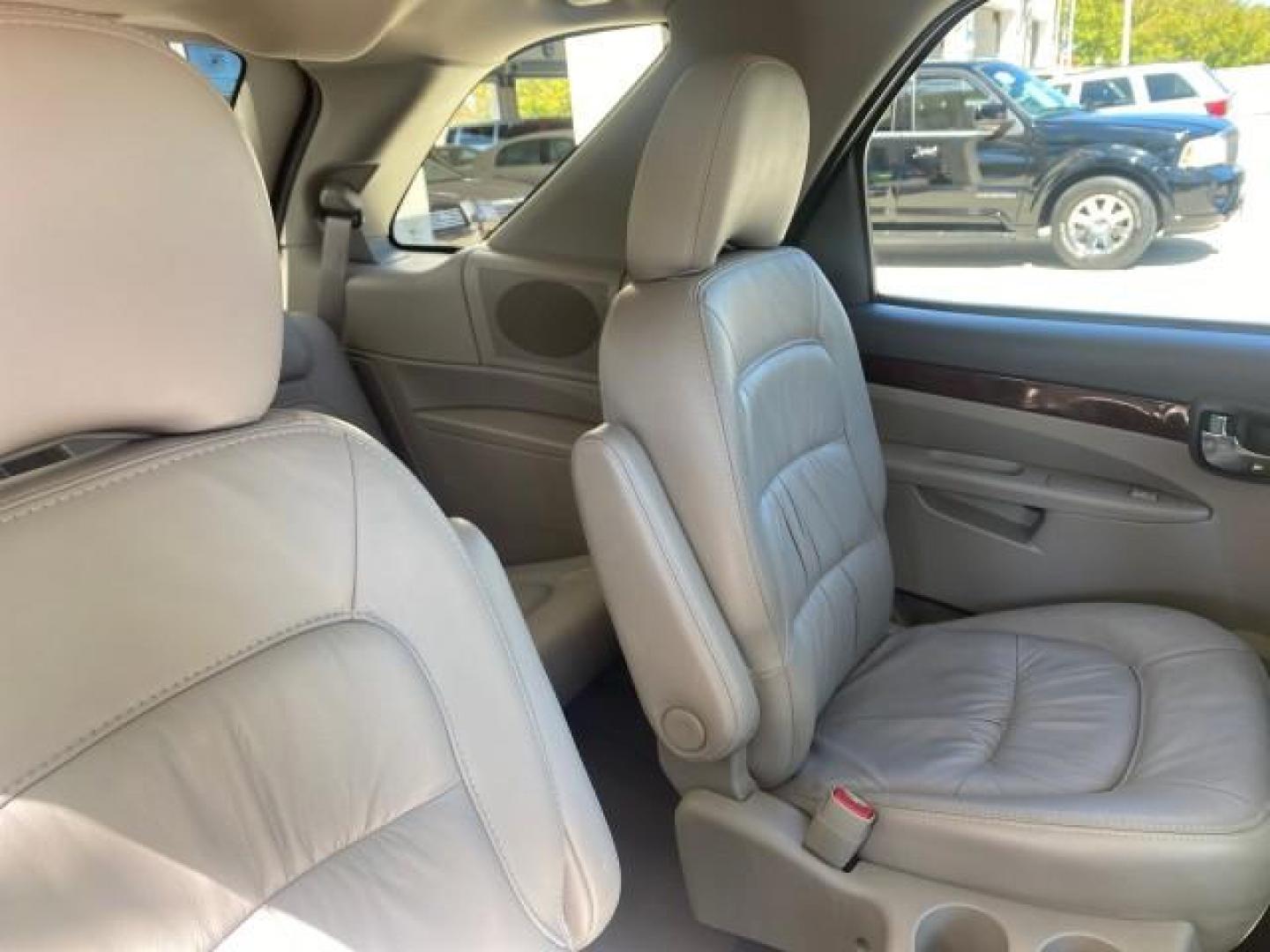 2007 Black Onyx /Gray Buick Rendezvous CXL LOW MILES 33,014 3RD ROW (3G5DA03L47S) with an 3.5L V6 SFI Engine engine, Automatic transmission, located at 4701 North Dixie Hwy, Pompano Beach, FL, 33064, (954) 422-2889, 26.240938, -80.123474 - OUR WEBPAGE FLORIDACARS1.COM HAS OVER 100 PHOTOS AND FREE CARFAX LINK 2007 BUICK RENDEZVOUS CXL NEW $32,314 VIN: 3G5DA03L47S575376 3 G 5 D A 0 3 L 4 7 S 5 7 5 3 7 6 4 DOOR WAGON/SPORT UTILITY 3.5L V6 F 17 INCH CHROME RIMS GASOLINE FRONT WHEEL DRIVE Highlighted Features Heated Seats Leather Seats AM/ - Photo#92