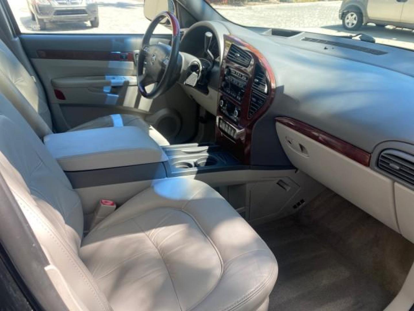 2007 Black Onyx /Gray Buick Rendezvous CXL LOW MILES 33,014 3RD ROW (3G5DA03L47S) with an 3.5L V6 SFI Engine engine, Automatic transmission, located at 4701 North Dixie Hwy, Pompano Beach, FL, 33064, (954) 422-2889, 26.240938, -80.123474 - OUR WEBPAGE FLORIDACARS1.COM HAS OVER 100 PHOTOS AND FREE CARFAX LINK 2007 BUICK RENDEZVOUS CXL NEW $32,314 VIN: 3G5DA03L47S575376 3 G 5 D A 0 3 L 4 7 S 5 7 5 3 7 6 4 DOOR WAGON/SPORT UTILITY 3.5L V6 F 17 INCH CHROME RIMS GASOLINE FRONT WHEEL DRIVE Highlighted Features Heated Seats Leather Seats AM/ - Photo#96