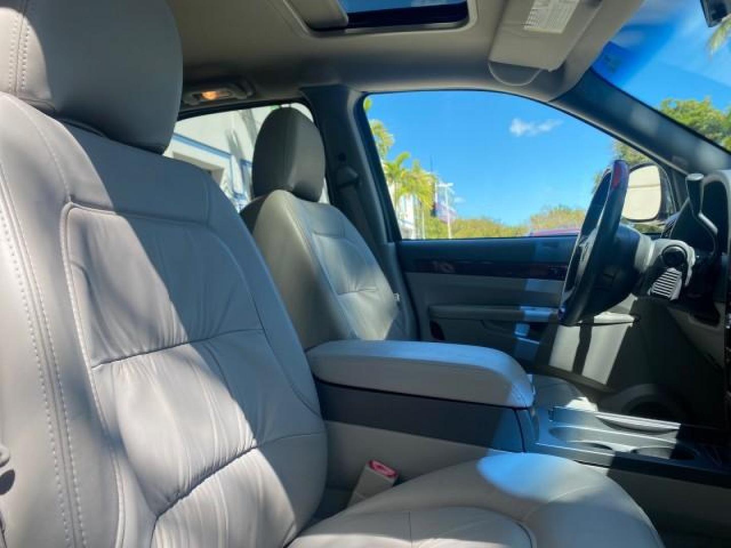 2007 Black Onyx /Gray Buick Rendezvous CXL LOW MILES 33,014 3RD ROW (3G5DA03L47S) with an 3.5L V6 SFI Engine engine, Automatic transmission, located at 4701 North Dixie Hwy, Pompano Beach, FL, 33064, (954) 422-2889, 26.240938, -80.123474 - OUR WEBPAGE FLORIDACARS1.COM HAS OVER 100 PHOTOS AND FREE CARFAX LINK 2007 BUICK RENDEZVOUS CXL NEW $32,314 VIN: 3G5DA03L47S575376 3 G 5 D A 0 3 L 4 7 S 5 7 5 3 7 6 4 DOOR WAGON/SPORT UTILITY 3.5L V6 F 17 INCH CHROME RIMS GASOLINE FRONT WHEEL DRIVE Highlighted Features Heated Seats Leather Seats AM/ - Photo#98