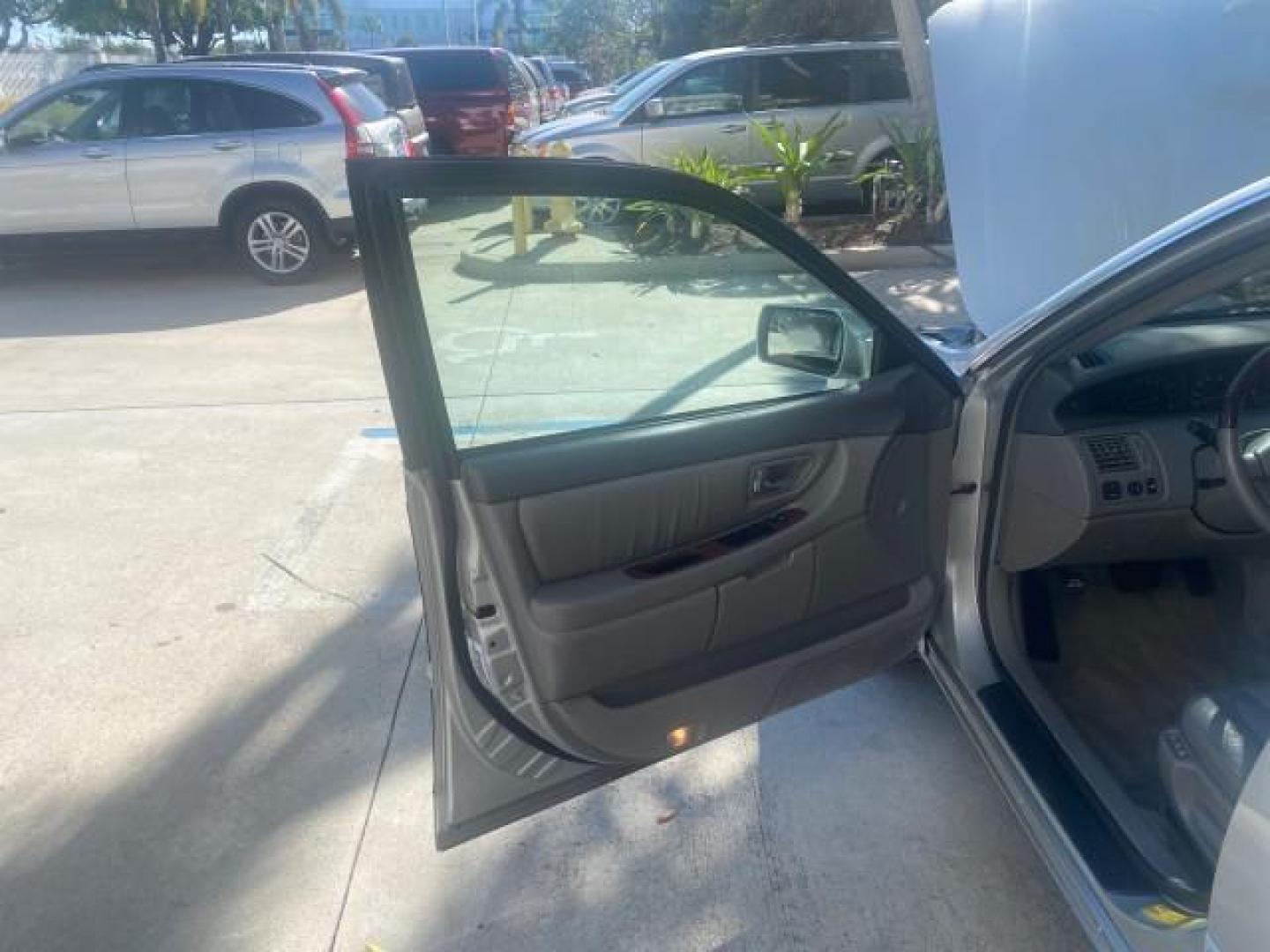 2003 Silver Spruce Metallic /Stone Toyota Avalon XLS 1 FL LOW MILES 32,452 (4T1BF28B03U) with an 3.0L DOHC MPFI 24-Valve V6 Engine engine, Automatic transmission, located at 4701 North Dixie Hwy, Pompano Beach, FL, 33064, (954) 422-2889, 26.240938, -80.123474 - OUR WEBPAGE FLORIDACARS1.COM HAS OVER 100 PHOTOS AND FREE CARFAX LINK 2003 TOYOTA AVALON XLS BUCKET LEATHER SEATS ! VIN: 4T1BF28B03U273831 4 T 1 B F 2 8 B 0 3 U 2 7 3 8 3 1 SEDAN 4 DR 3.0L V6 F DOHC 24V GASOLINE 29 MPG FRONT WHEEL DRIVE TIRES LOOK LIKE NEW ! Top Features Alloy Wheels Luxury Package - Photo#9
