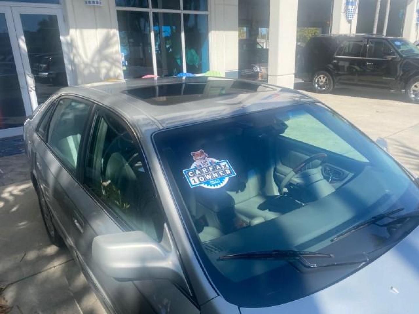 2003 Silver Spruce Metallic /Stone Toyota Avalon XLS 1 FL LOW MILES 32,452 (4T1BF28B03U) with an 3.0L DOHC MPFI 24-Valve V6 Engine engine, Automatic transmission, located at 4701 North Dixie Hwy, Pompano Beach, FL, 33064, (954) 422-2889, 26.240938, -80.123474 - OUR WEBPAGE FLORIDACARS1.COM HAS OVER 100 PHOTOS AND FREE CARFAX LINK 2003 TOYOTA AVALON XLS BUCKET LEATHER SEATS ! VIN: 4T1BF28B03U273831 4 T 1 B F 2 8 B 0 3 U 2 7 3 8 3 1 SEDAN 4 DR 3.0L V6 F DOHC 24V GASOLINE 29 MPG FRONT WHEEL DRIVE TIRES LOOK LIKE NEW ! Top Features Alloy Wheels Luxury Package - Photo#99
