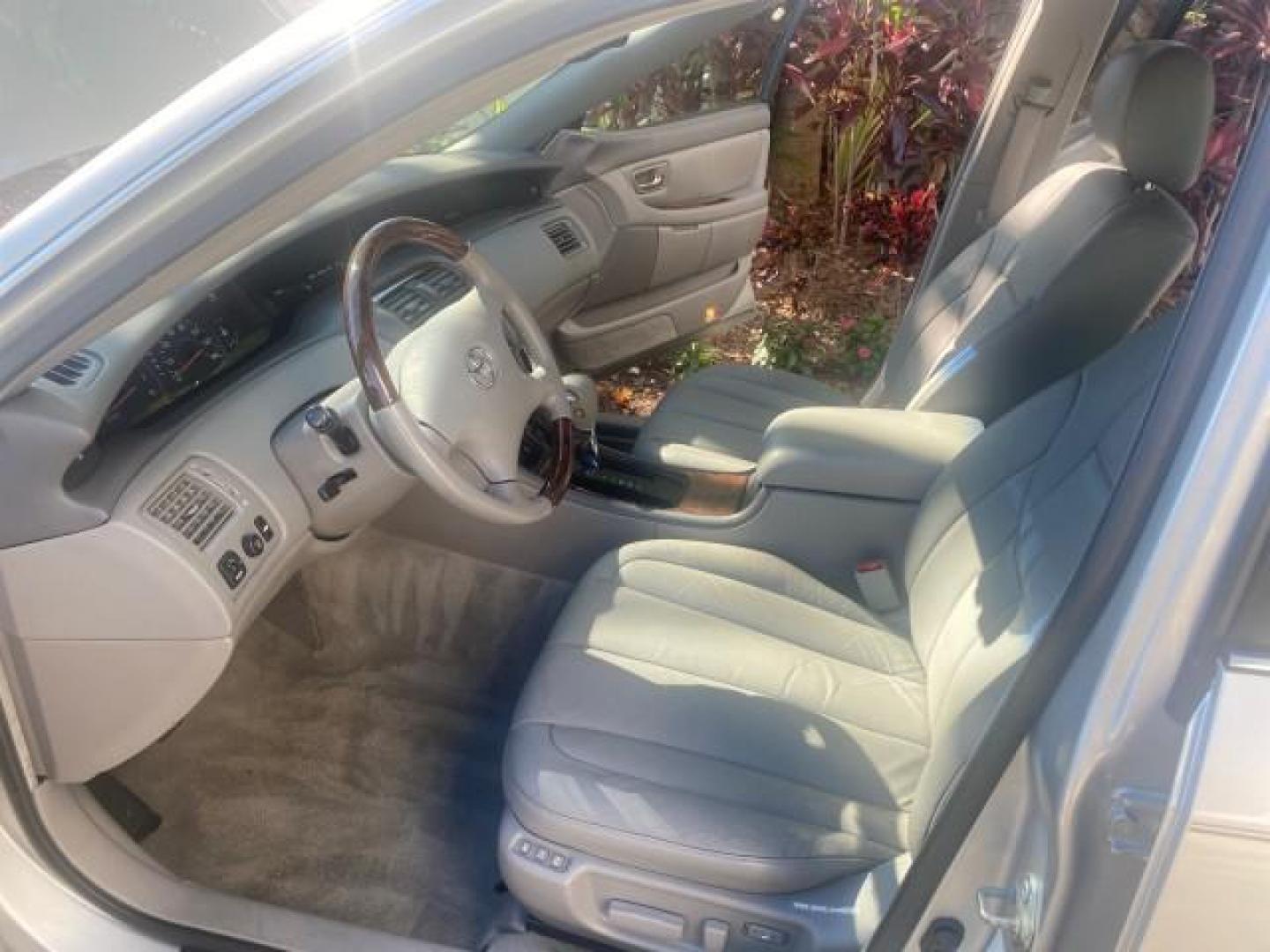 2003 Silver Spruce Metallic /Stone Toyota Avalon XLS 1 FL LOW MILES 32,452 (4T1BF28B03U) with an 3.0L DOHC MPFI 24-Valve V6 Engine engine, Automatic transmission, located at 4701 North Dixie Hwy, Pompano Beach, FL, 33064, (954) 422-2889, 26.240938, -80.123474 - OUR WEBPAGE FLORIDACARS1.COM HAS OVER 100 PHOTOS AND FREE CARFAX LINK 2003 TOYOTA AVALON XLS BUCKET LEATHER SEATS ! VIN: 4T1BF28B03U273831 4 T 1 B F 2 8 B 0 3 U 2 7 3 8 3 1 SEDAN 4 DR 3.0L V6 F DOHC 24V GASOLINE 29 MPG FRONT WHEEL DRIVE TIRES LOOK LIKE NEW ! Top Features Alloy Wheels Luxury Package - Photo#10