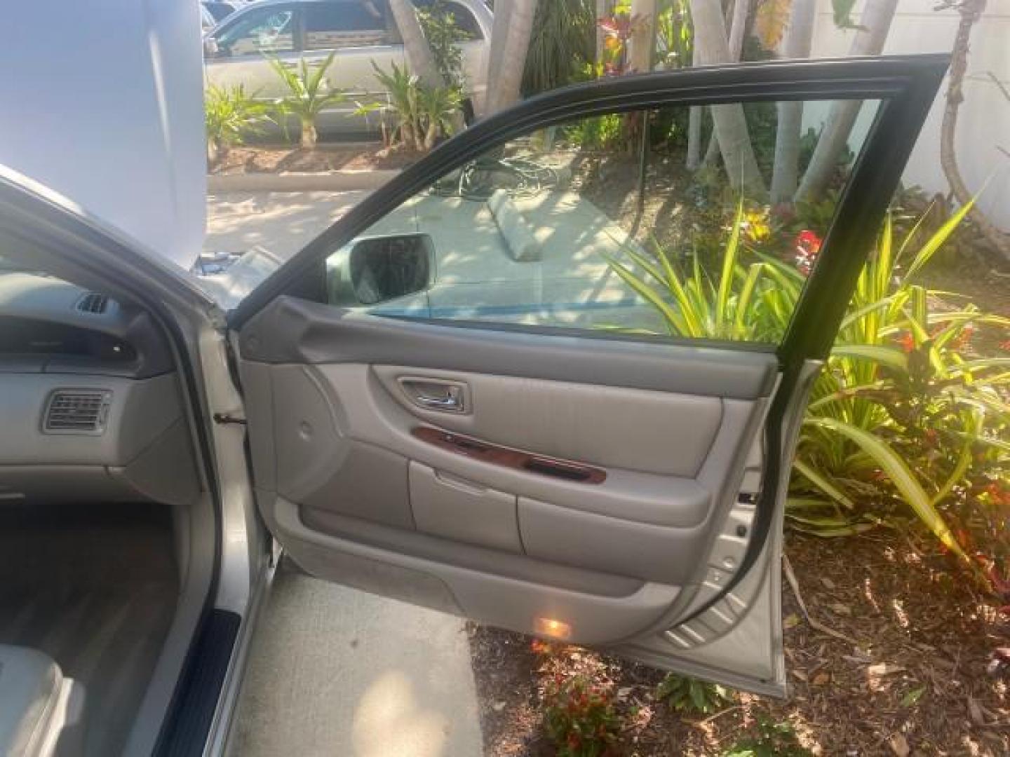 2003 Silver Spruce Metallic /Stone Toyota Avalon XLS 1 FL LOW MILES 32,452 (4T1BF28B03U) with an 3.0L DOHC MPFI 24-Valve V6 Engine engine, Automatic transmission, located at 4701 North Dixie Hwy, Pompano Beach, FL, 33064, (954) 422-2889, 26.240938, -80.123474 - OUR WEBPAGE FLORIDACARS1.COM HAS OVER 100 PHOTOS AND FREE CARFAX LINK 2003 TOYOTA AVALON XLS BUCKET LEATHER SEATS ! VIN: 4T1BF28B03U273831 4 T 1 B F 2 8 B 0 3 U 2 7 3 8 3 1 SEDAN 4 DR 3.0L V6 F DOHC 24V GASOLINE 29 MPG FRONT WHEEL DRIVE TIRES LOOK LIKE NEW ! Top Features Alloy Wheels Luxury Package - Photo#11