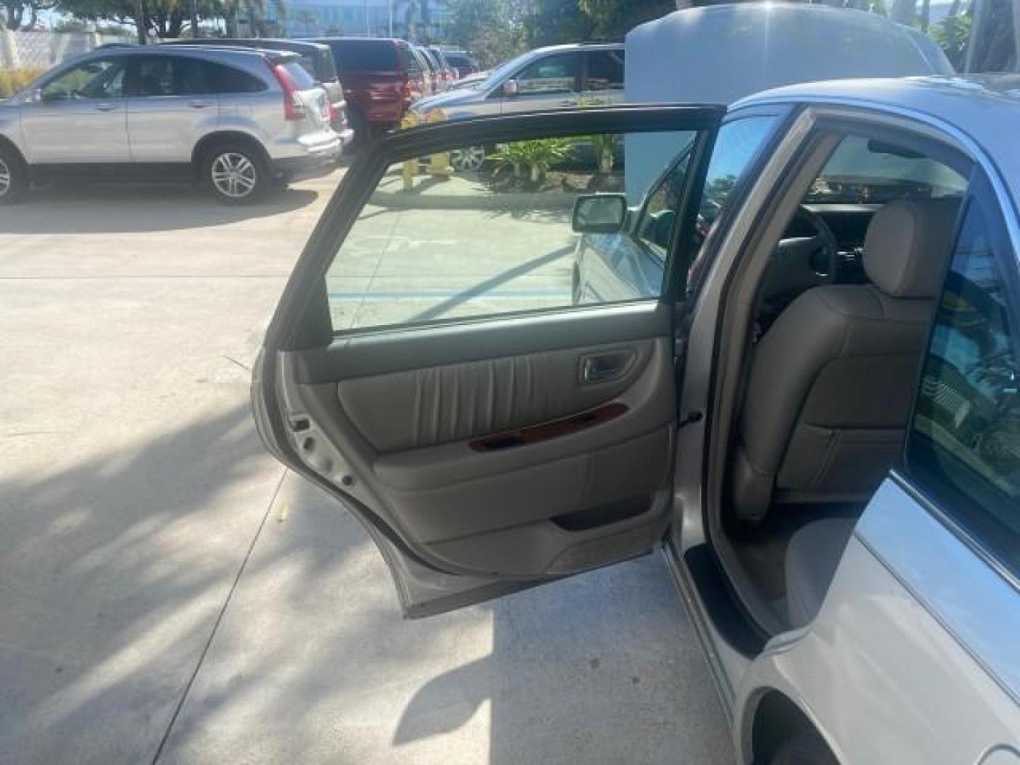 2003 Silver Spruce Metallic /Stone Toyota Avalon XLS 1 FL LOW MILES 32,452 (4T1BF28B03U) with an 3.0L DOHC MPFI 24-Valve V6 Engine engine, Automatic transmission, located at 4701 North Dixie Hwy, Pompano Beach, FL, 33064, (954) 422-2889, 26.240938, -80.123474 - OUR WEBPAGE FLORIDACARS1.COM HAS OVER 100 PHOTOS AND FREE CARFAX LINK 2003 TOYOTA AVALON XLS BUCKET LEATHER SEATS ! VIN: 4T1BF28B03U273831 4 T 1 B F 2 8 B 0 3 U 2 7 3 8 3 1 SEDAN 4 DR 3.0L V6 F DOHC 24V GASOLINE 29 MPG FRONT WHEEL DRIVE TIRES LOOK LIKE NEW ! Top Features Alloy Wheels Luxury Package - Photo#13