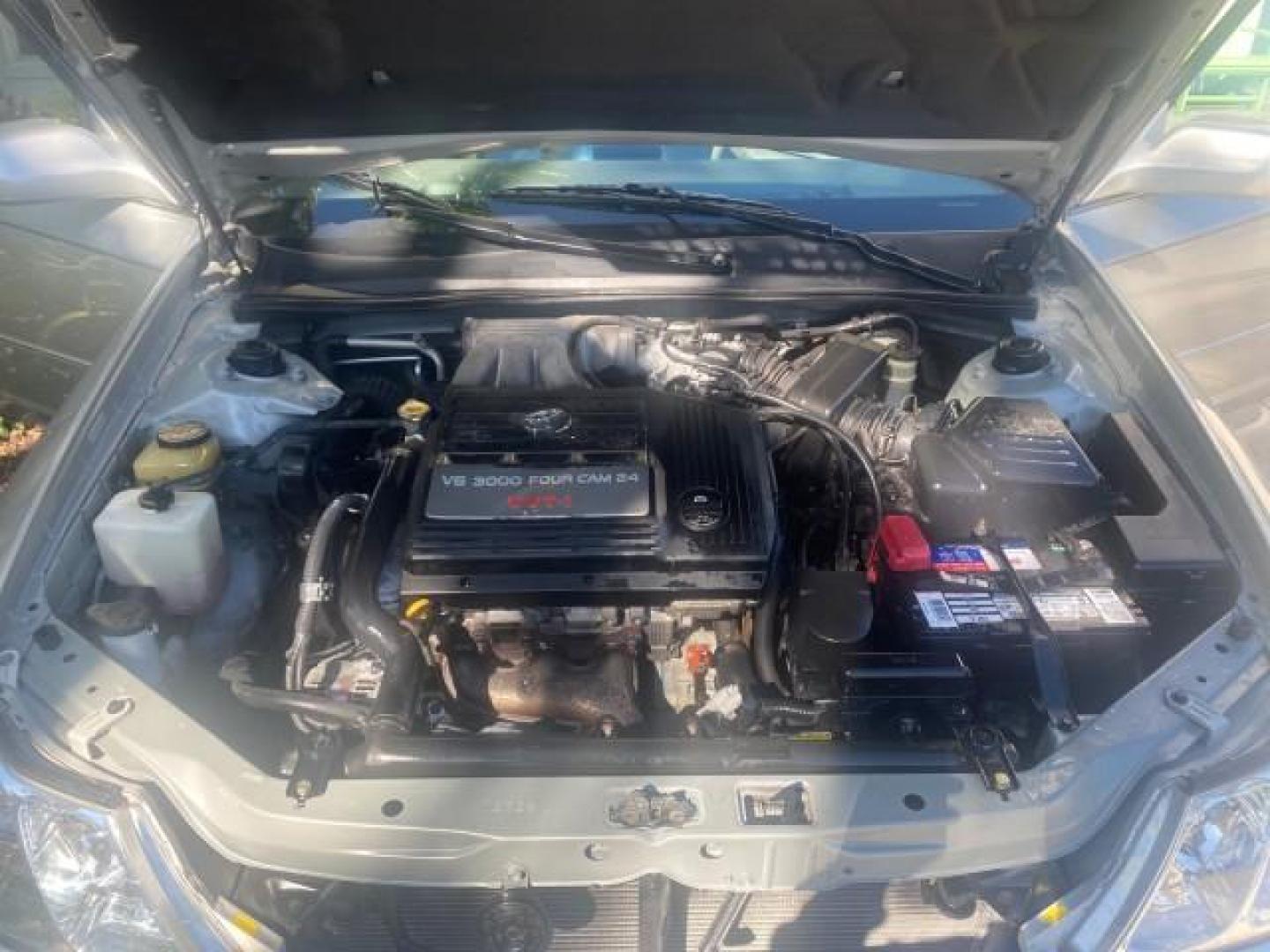 2003 Silver Spruce Metallic /Stone Toyota Avalon XLS 1 FL LOW MILES 32,452 (4T1BF28B03U) with an 3.0L DOHC MPFI 24-Valve V6 Engine engine, Automatic transmission, located at 4701 North Dixie Hwy, Pompano Beach, FL, 33064, (954) 422-2889, 26.240938, -80.123474 - OUR WEBPAGE FLORIDACARS1.COM HAS OVER 100 PHOTOS AND FREE CARFAX LINK 2003 TOYOTA AVALON XLS BUCKET LEATHER SEATS ! VIN: 4T1BF28B03U273831 4 T 1 B F 2 8 B 0 3 U 2 7 3 8 3 1 SEDAN 4 DR 3.0L V6 F DOHC 24V GASOLINE 29 MPG FRONT WHEEL DRIVE TIRES LOOK LIKE NEW ! Top Features Alloy Wheels Luxury Package - Photo#17