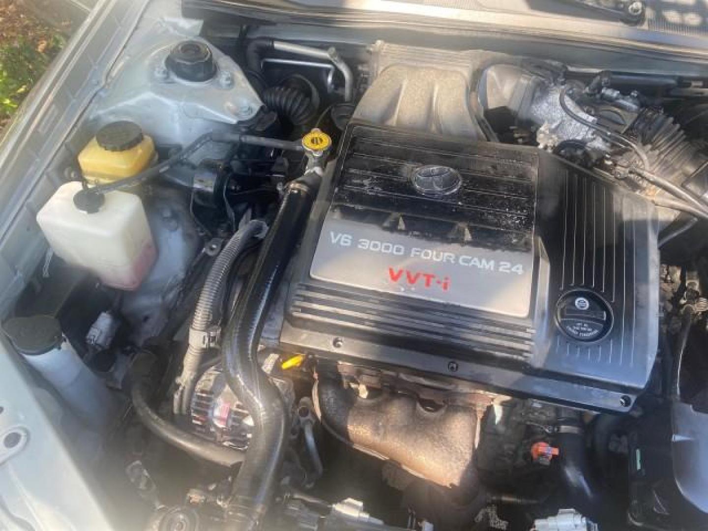 2003 Silver Spruce Metallic /Stone Toyota Avalon XLS 1 FL LOW MILES 32,452 (4T1BF28B03U) with an 3.0L DOHC MPFI 24-Valve V6 Engine engine, Automatic transmission, located at 4701 North Dixie Hwy, Pompano Beach, FL, 33064, (954) 422-2889, 26.240938, -80.123474 - OUR WEBPAGE FLORIDACARS1.COM HAS OVER 100 PHOTOS AND FREE CARFAX LINK 2003 TOYOTA AVALON XLS BUCKET LEATHER SEATS ! VIN: 4T1BF28B03U273831 4 T 1 B F 2 8 B 0 3 U 2 7 3 8 3 1 SEDAN 4 DR 3.0L V6 F DOHC 24V GASOLINE 29 MPG FRONT WHEEL DRIVE TIRES LOOK LIKE NEW ! Top Features Alloy Wheels Luxury Package - Photo#24