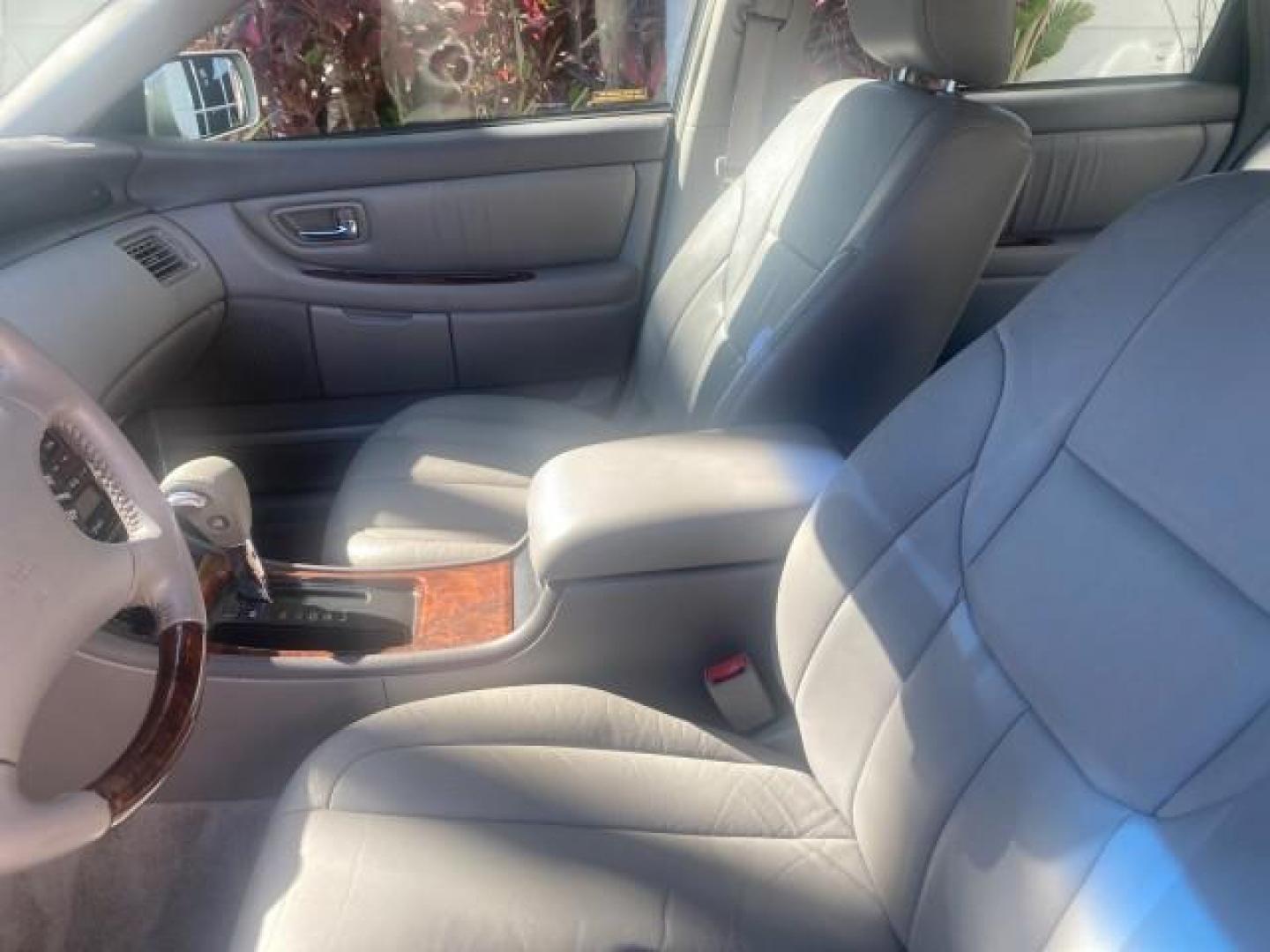 2003 Silver Spruce Metallic /Stone Toyota Avalon XLS 1 FL LOW MILES 32,452 (4T1BF28B03U) with an 3.0L DOHC MPFI 24-Valve V6 Engine engine, Automatic transmission, located at 4701 North Dixie Hwy, Pompano Beach, FL, 33064, (954) 422-2889, 26.240938, -80.123474 - OUR WEBPAGE FLORIDACARS1.COM HAS OVER 100 PHOTOS AND FREE CARFAX LINK 2003 TOYOTA AVALON XLS BUCKET LEATHER SEATS ! VIN: 4T1BF28B03U273831 4 T 1 B F 2 8 B 0 3 U 2 7 3 8 3 1 SEDAN 4 DR 3.0L V6 F DOHC 24V GASOLINE 29 MPG FRONT WHEEL DRIVE TIRES LOOK LIKE NEW ! Top Features Alloy Wheels Luxury Package - Photo#34