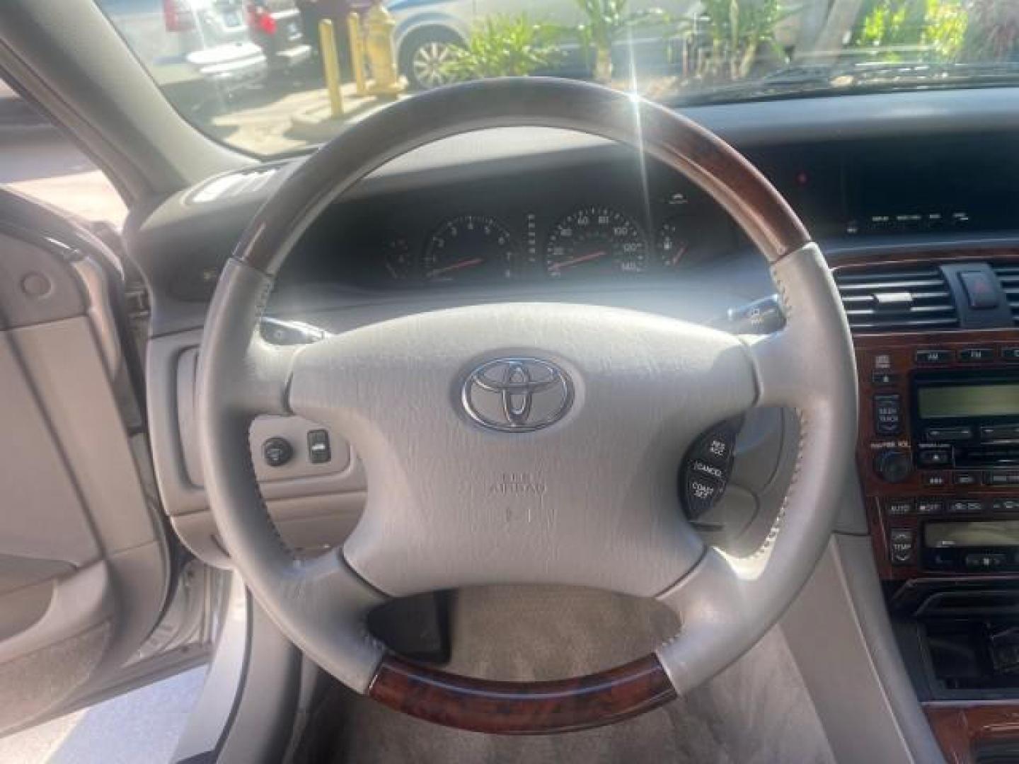2003 Silver Spruce Metallic /Stone Toyota Avalon XLS 1 FL LOW MILES 32,452 (4T1BF28B03U) with an 3.0L DOHC MPFI 24-Valve V6 Engine engine, Automatic transmission, located at 4701 North Dixie Hwy, Pompano Beach, FL, 33064, (954) 422-2889, 26.240938, -80.123474 - OUR WEBPAGE FLORIDACARS1.COM HAS OVER 100 PHOTOS AND FREE CARFAX LINK 2003 TOYOTA AVALON XLS BUCKET LEATHER SEATS ! VIN: 4T1BF28B03U273831 4 T 1 B F 2 8 B 0 3 U 2 7 3 8 3 1 SEDAN 4 DR 3.0L V6 F DOHC 24V GASOLINE 29 MPG FRONT WHEEL DRIVE TIRES LOOK LIKE NEW ! Top Features Alloy Wheels Luxury Package - Photo#36